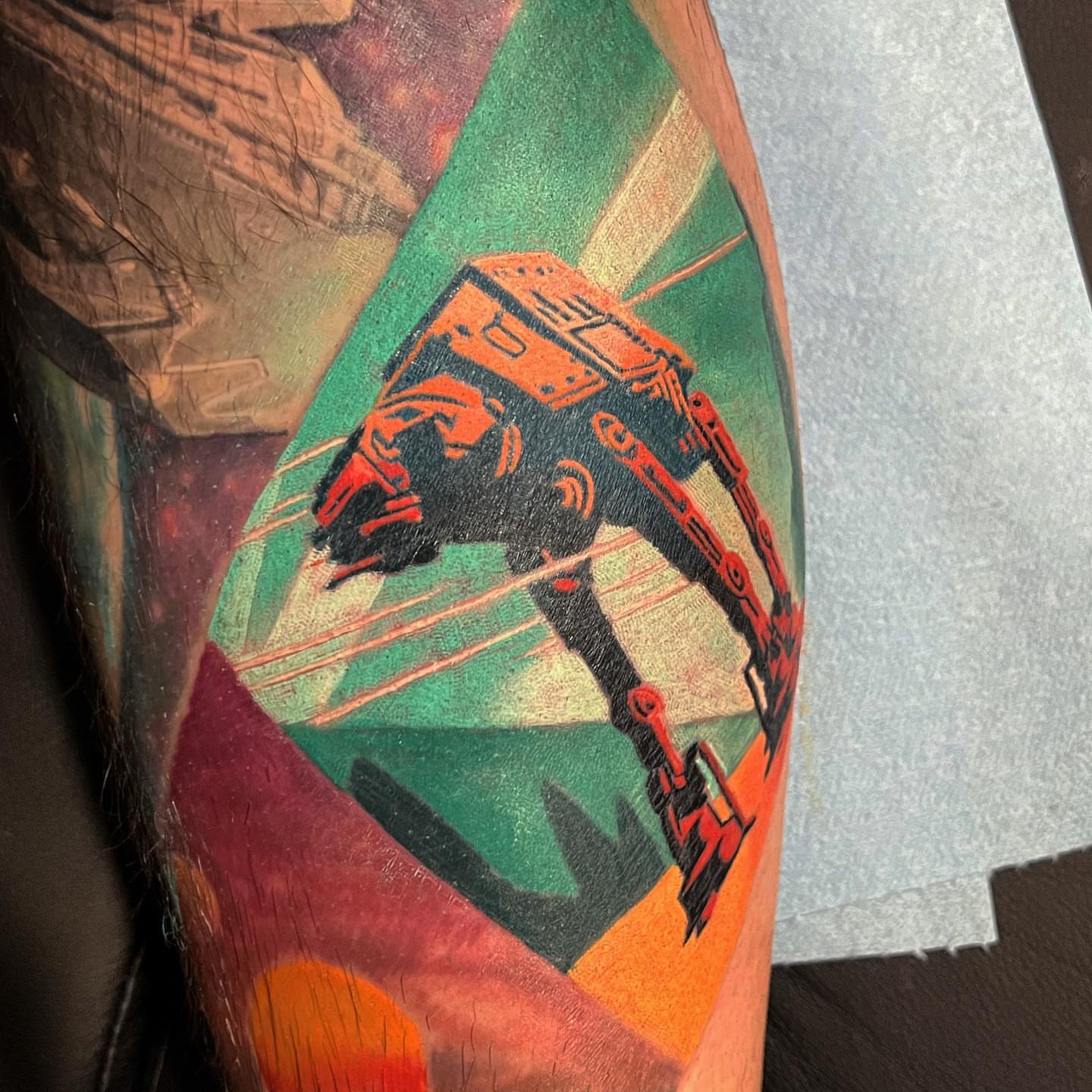 Robot geometric tattoo on the forearm by Tattoos by Alli Wilcox