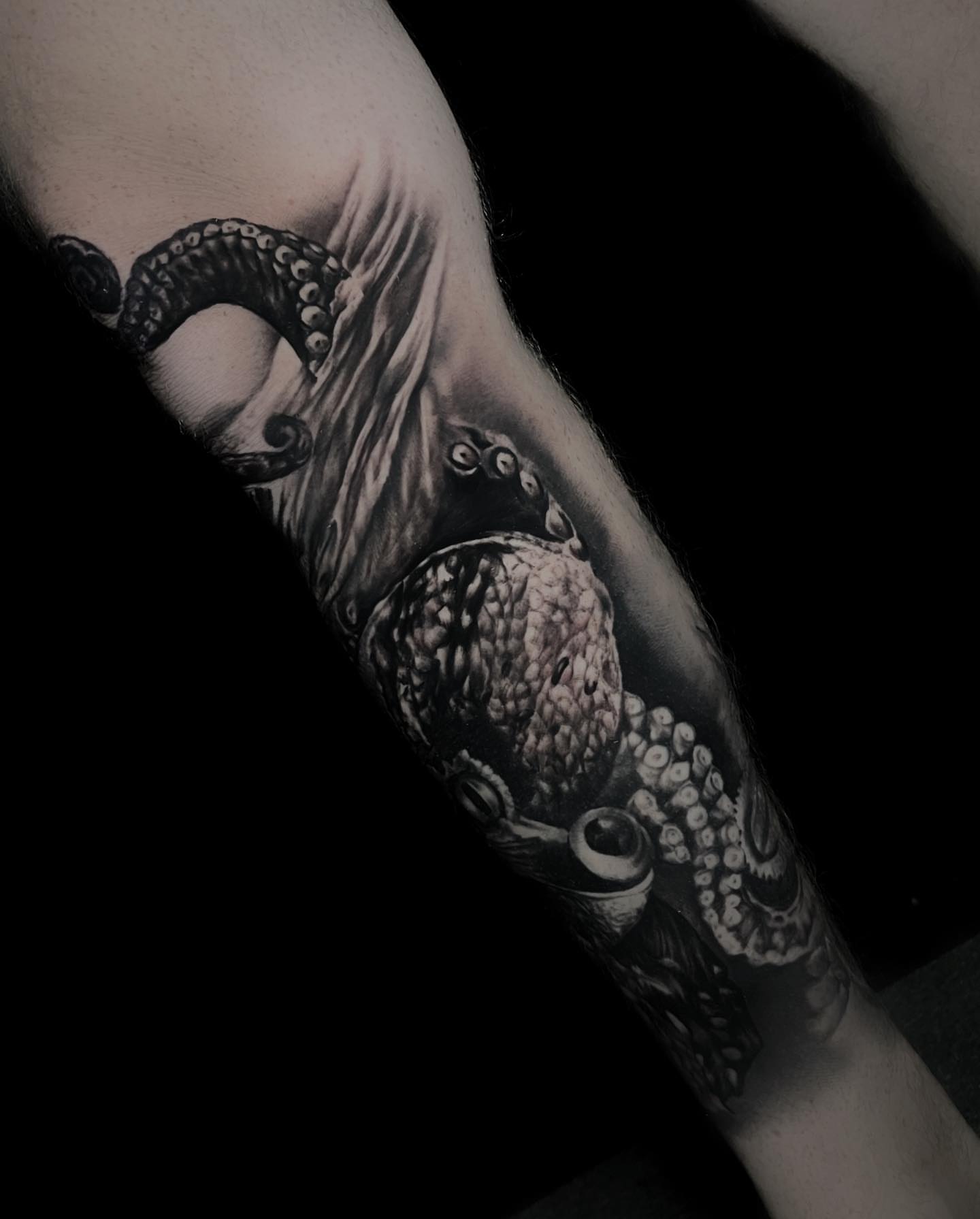 Octopus realism tattoo on the forearm by Matt Misiak