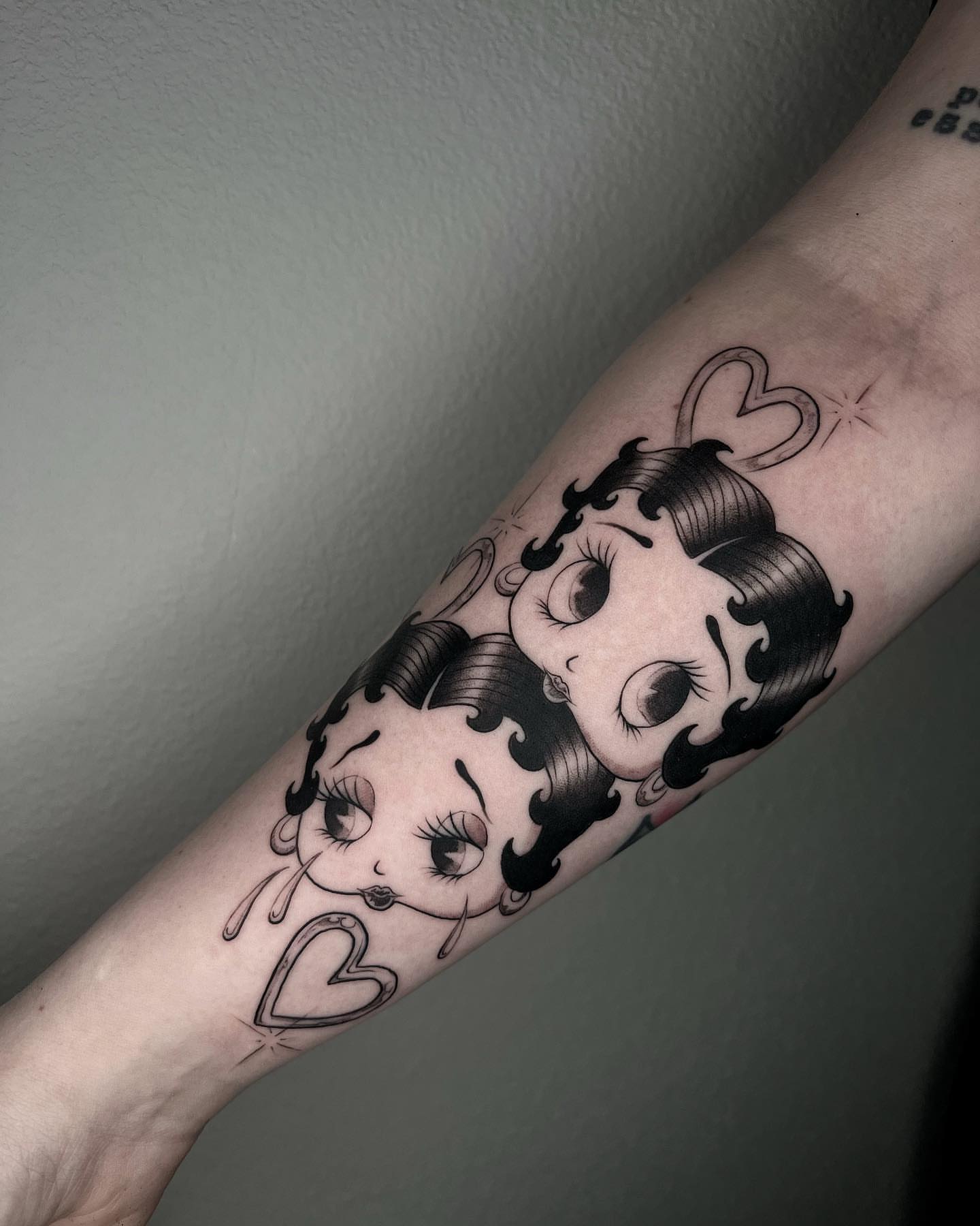 Betty Boop American traditional tattoo on the forearm by Angelo Buonanno, Las Vegas, Nevada