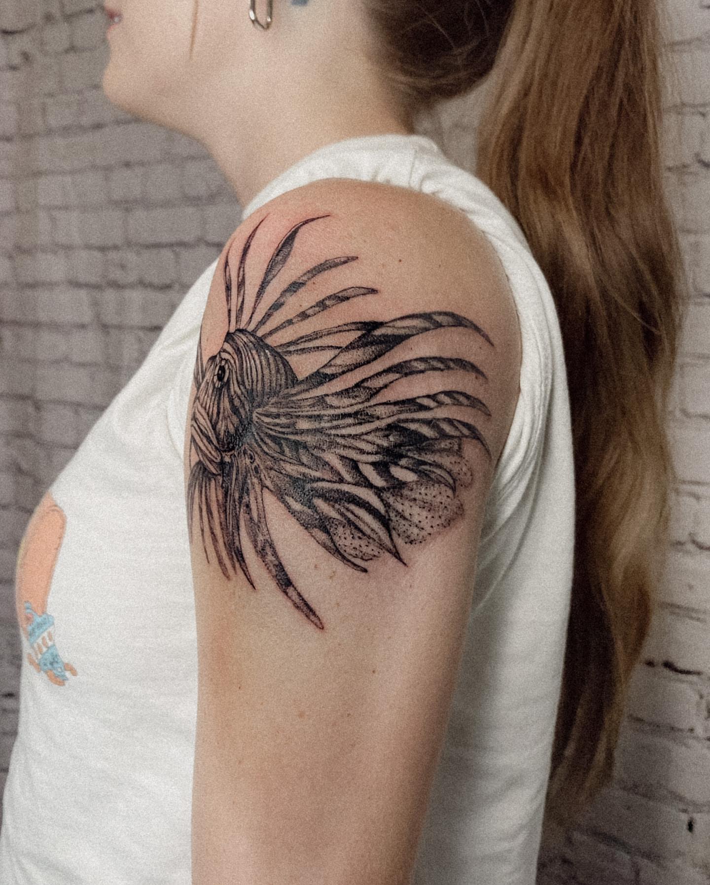 Lionfish dotwork tattoo on the shoulder by Ayauna Mai