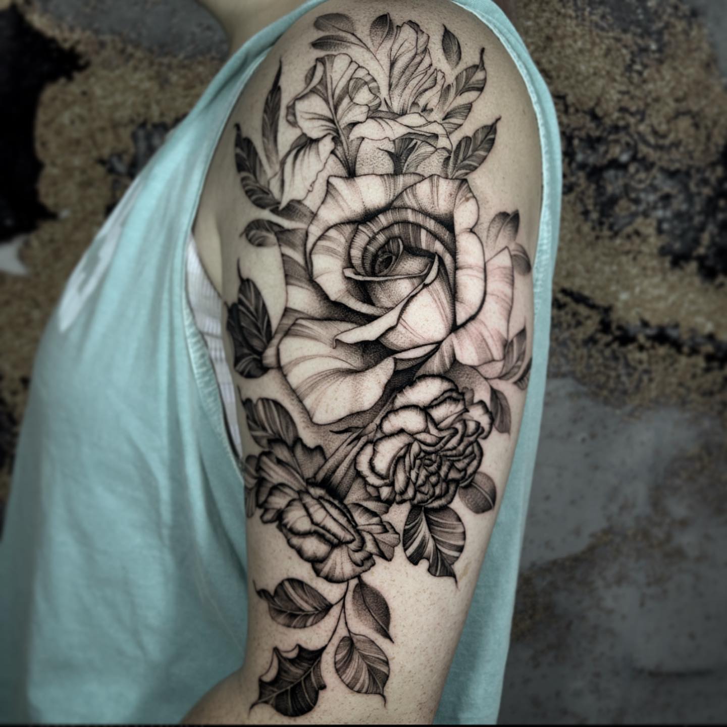 Floral bouquet realism tattoo on the shoulder by Cindy Xu