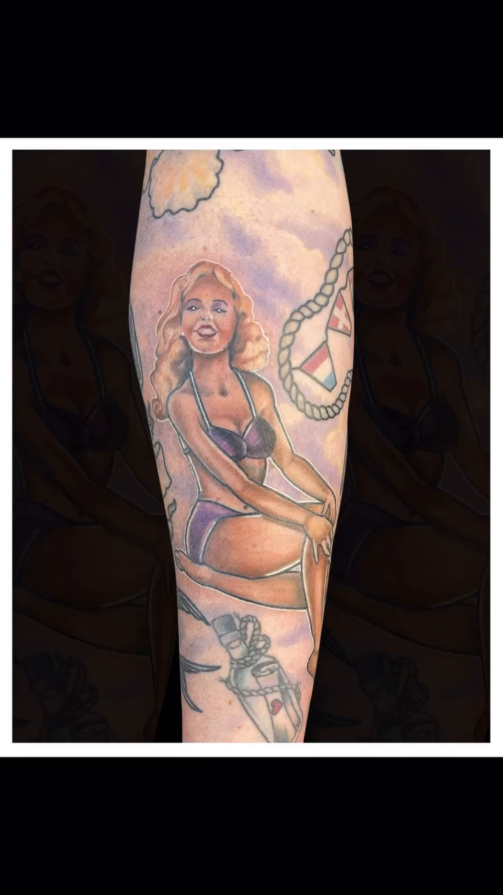 Pin-up girl with nautical elements American traditional tattoo by Nick Harrison, Dayton, Ohio