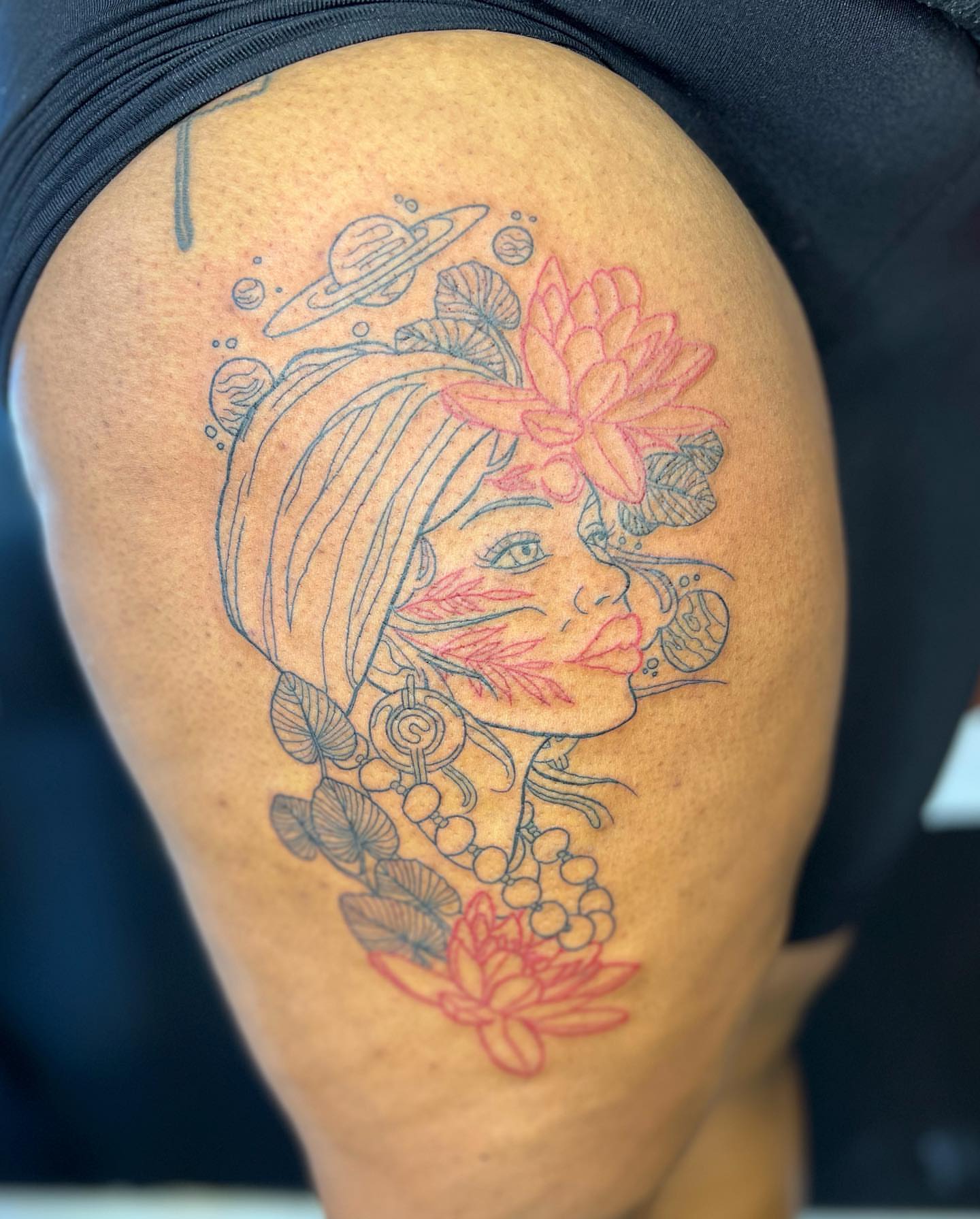 Woman with flowers illustrative tattoo on the shoulder by ✨BADJASS the tattoo artist✨