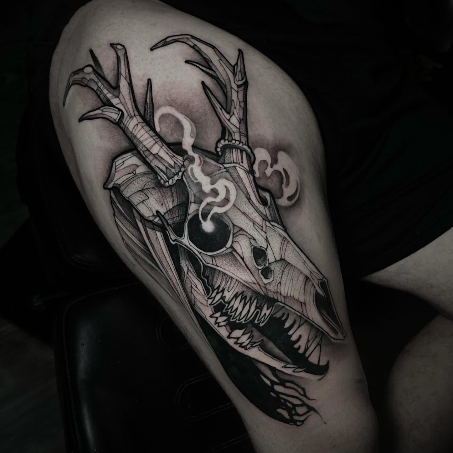 Deer skull realism tattoo on the thigh by Clayton Smith (BEAR)