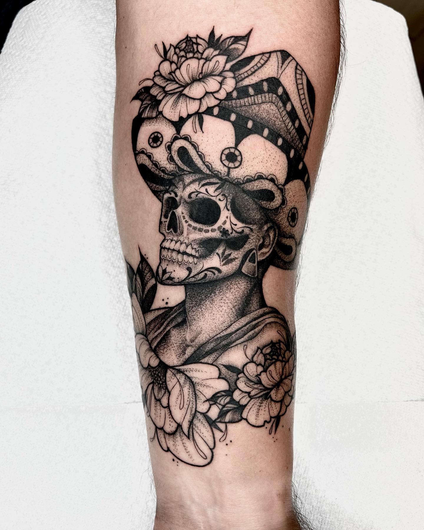 Sugar skull with floral crown dotwork tattoo on the forearm by 𝕤𝕒𝕧𝕒𝕟𝕟𝕒