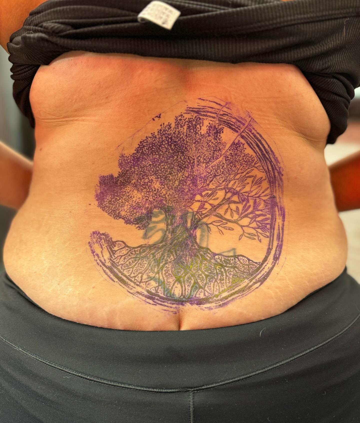 Tree dotwork tattoo on the torso by Alejandro Zaragoza