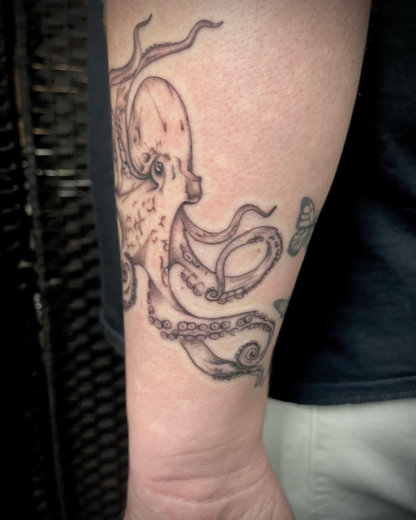 Octopus black and grey tattoo on the forearm by oh hey, robin.