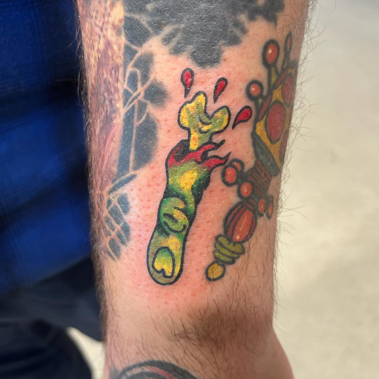 Lizard new school tattoo on the forearm by Deville Pinson