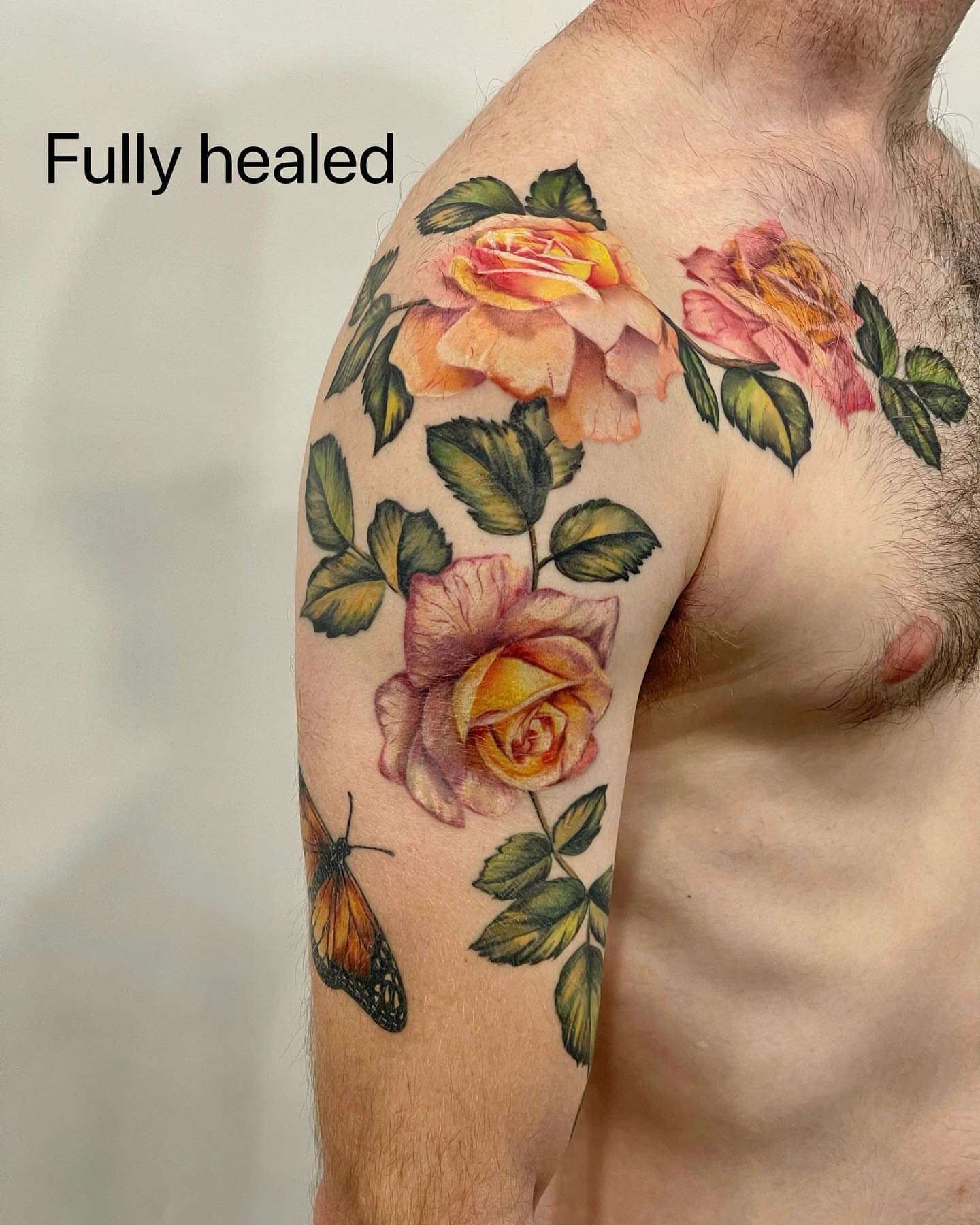 Roses and butterfly realism tattoo on the shoulder by Seattle Tattoo Artist PingPing, Seattle, Washington