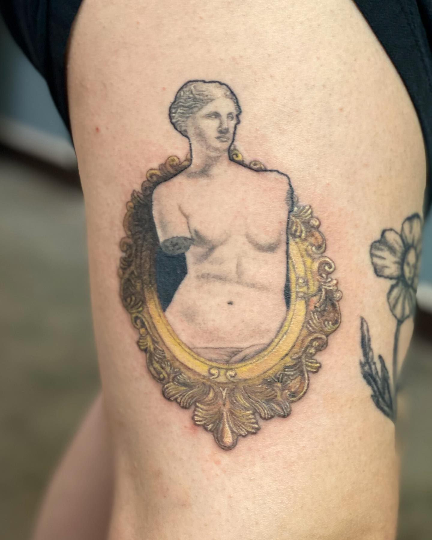 Statue in frame realism tattoo on the thigh by Maddy ⁂, Murfreesboro, Tennessee