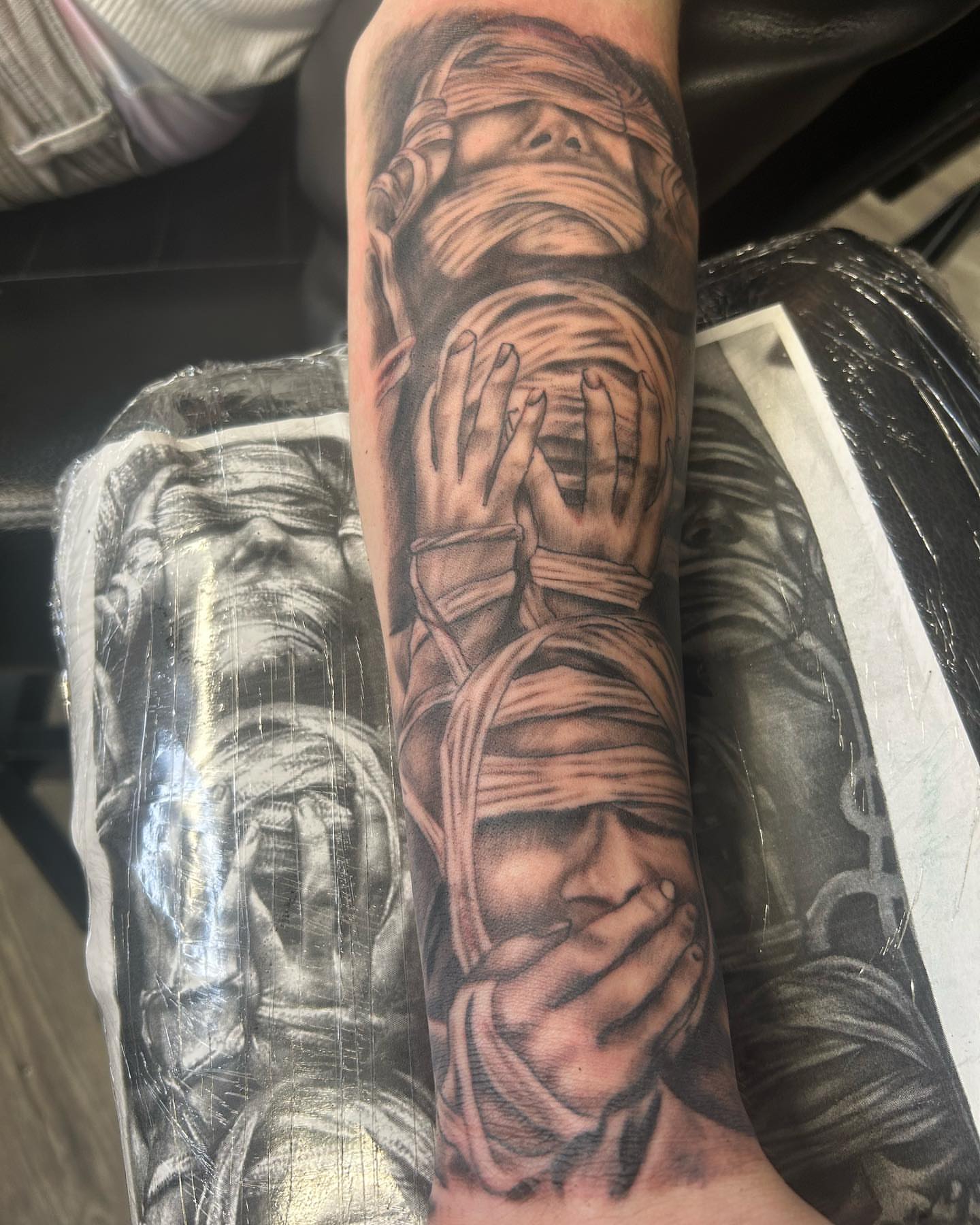 Tattoo by @alchemist_tattoo_shop — realism, black_and_grey
