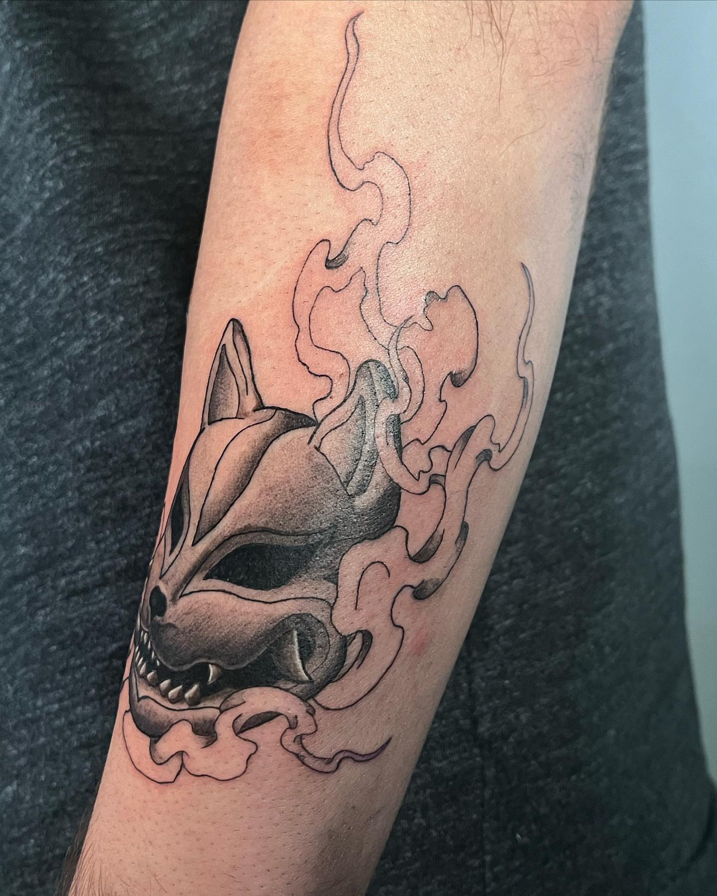 Fox head black and grey tattoo on the forearm by Anthony “Jiinky” Quintanilla 🧸☁️