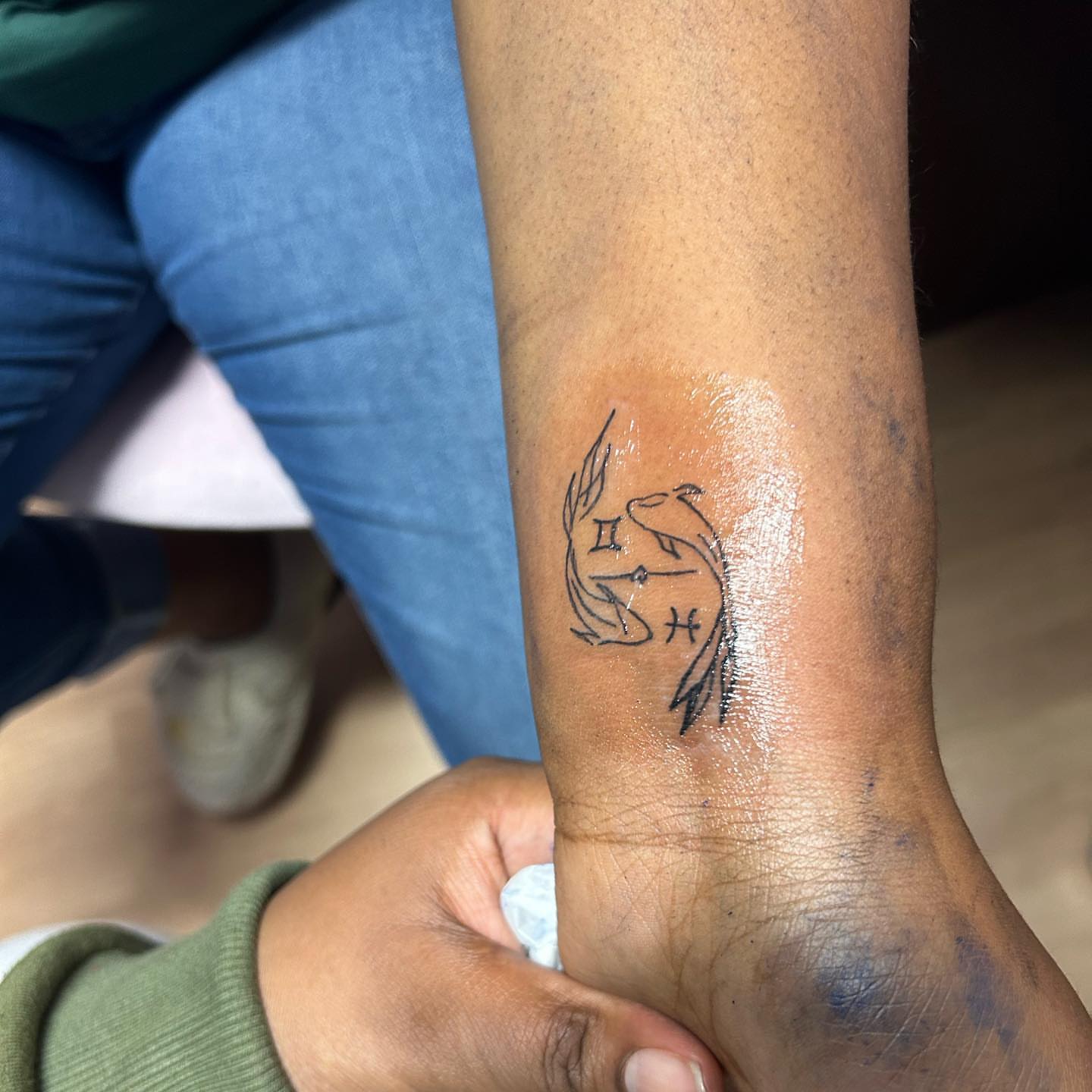 Bird and cross geometric tattoo on the forearm by ๐ฆ