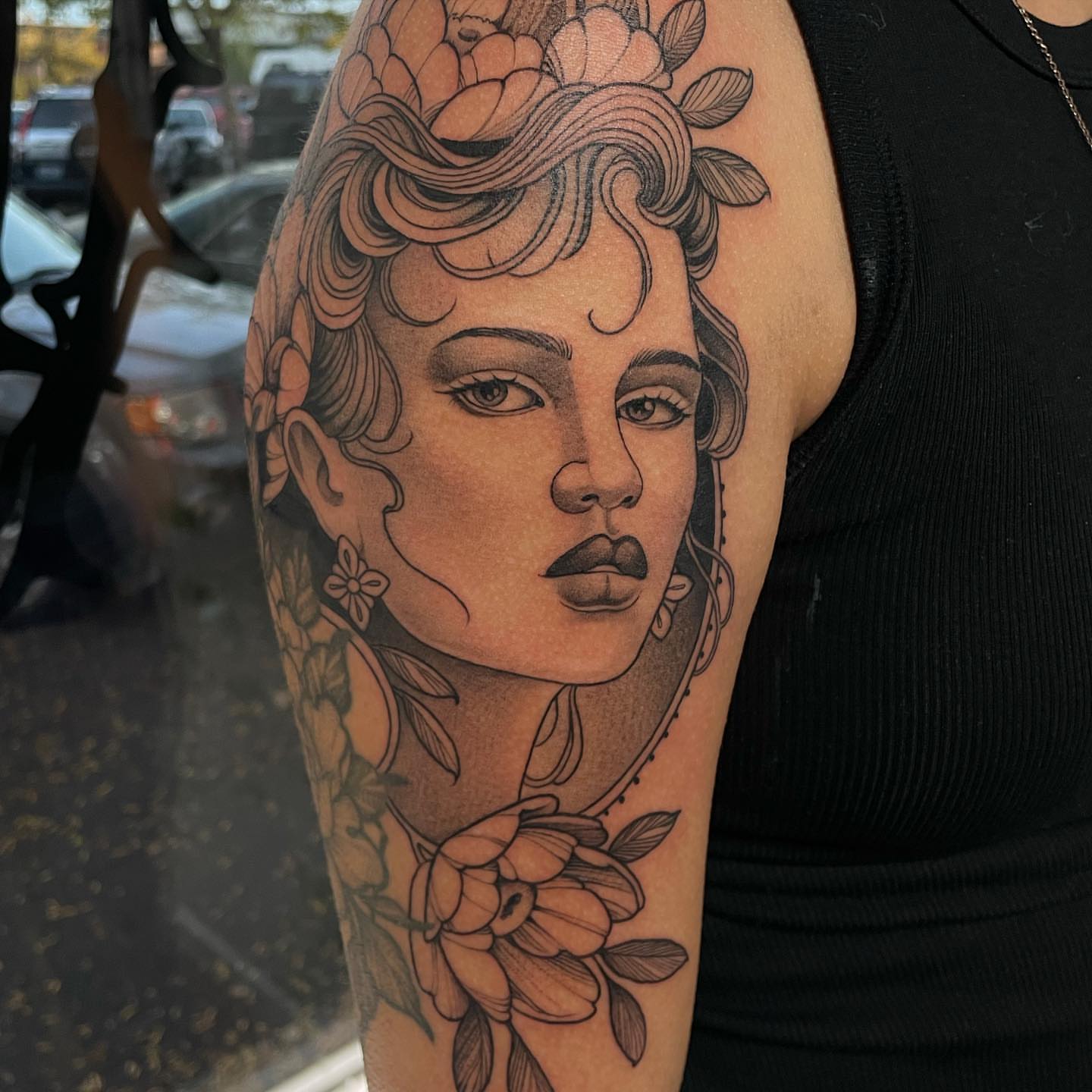 Woman's portrait realism tattoo on the forearm by Madelyn Roberts, Bellingham, Washington