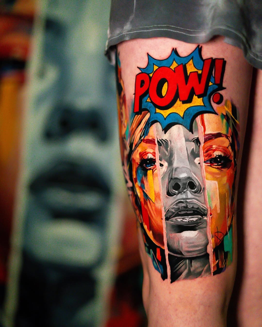 Woman's face with comic book "POW!" surrealism tattoo on the forearm by Israel De Jesus Legonier Aguliera