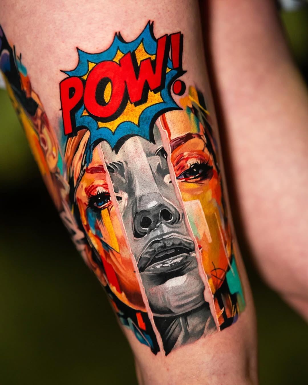 Woman's face with comic book "POW!" surrealism tattoo on the forearm by Israel De Jesus Legonier Aguliera