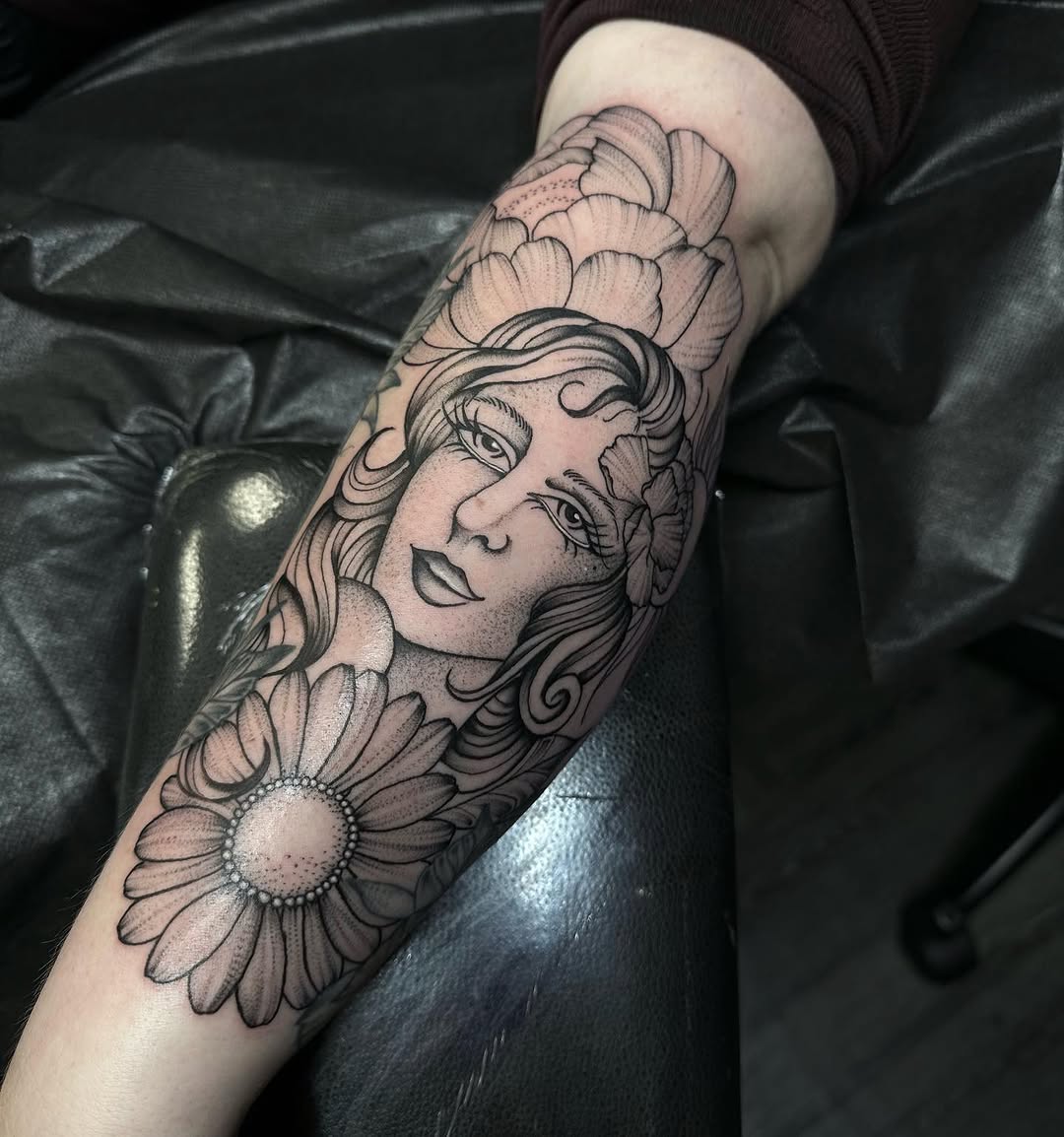 Woman with flowers sketch tattoo on the forearm by Ciera Farni, Murray, Utah