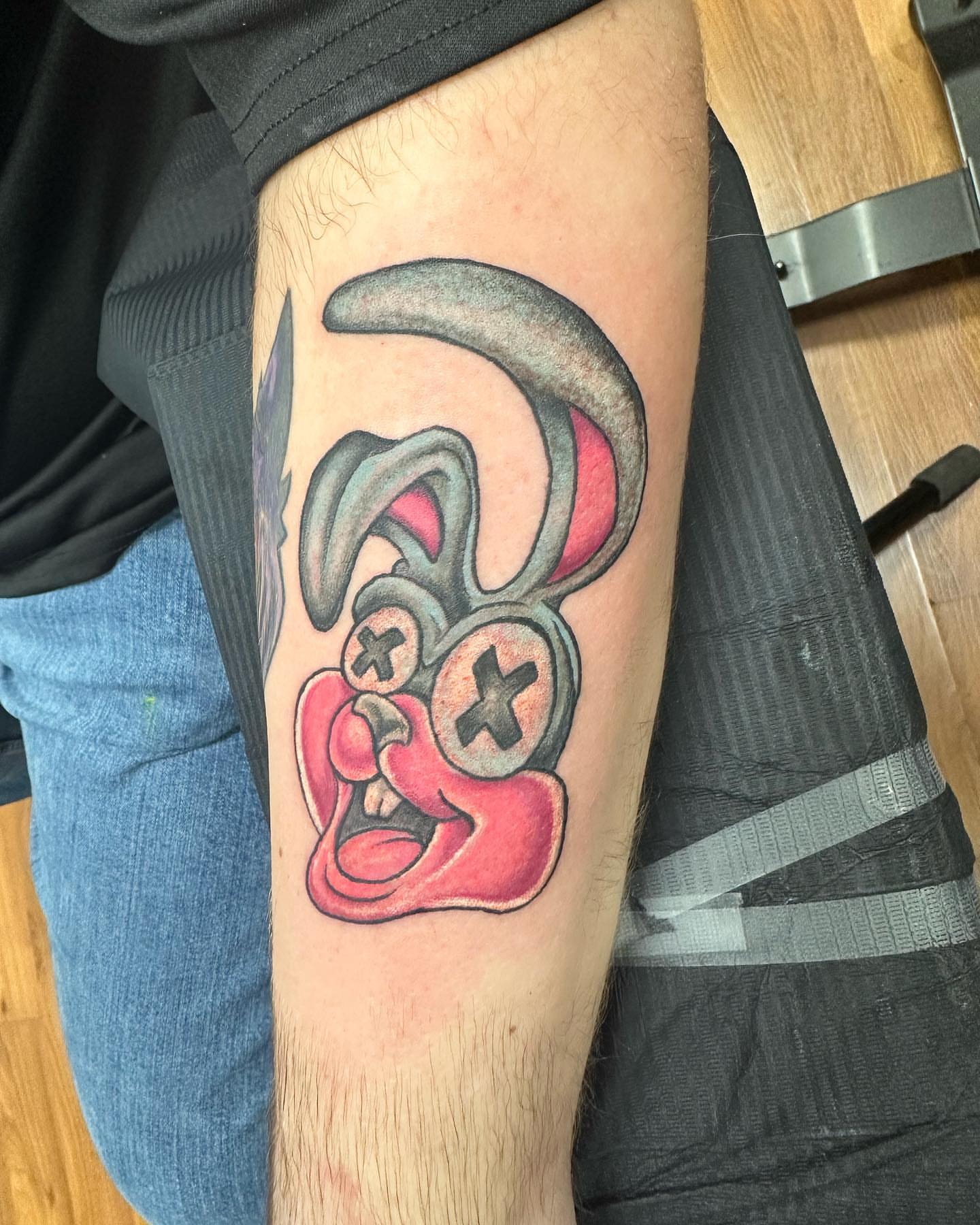 Jester mask American traditional tattoo on the forearm by KJ