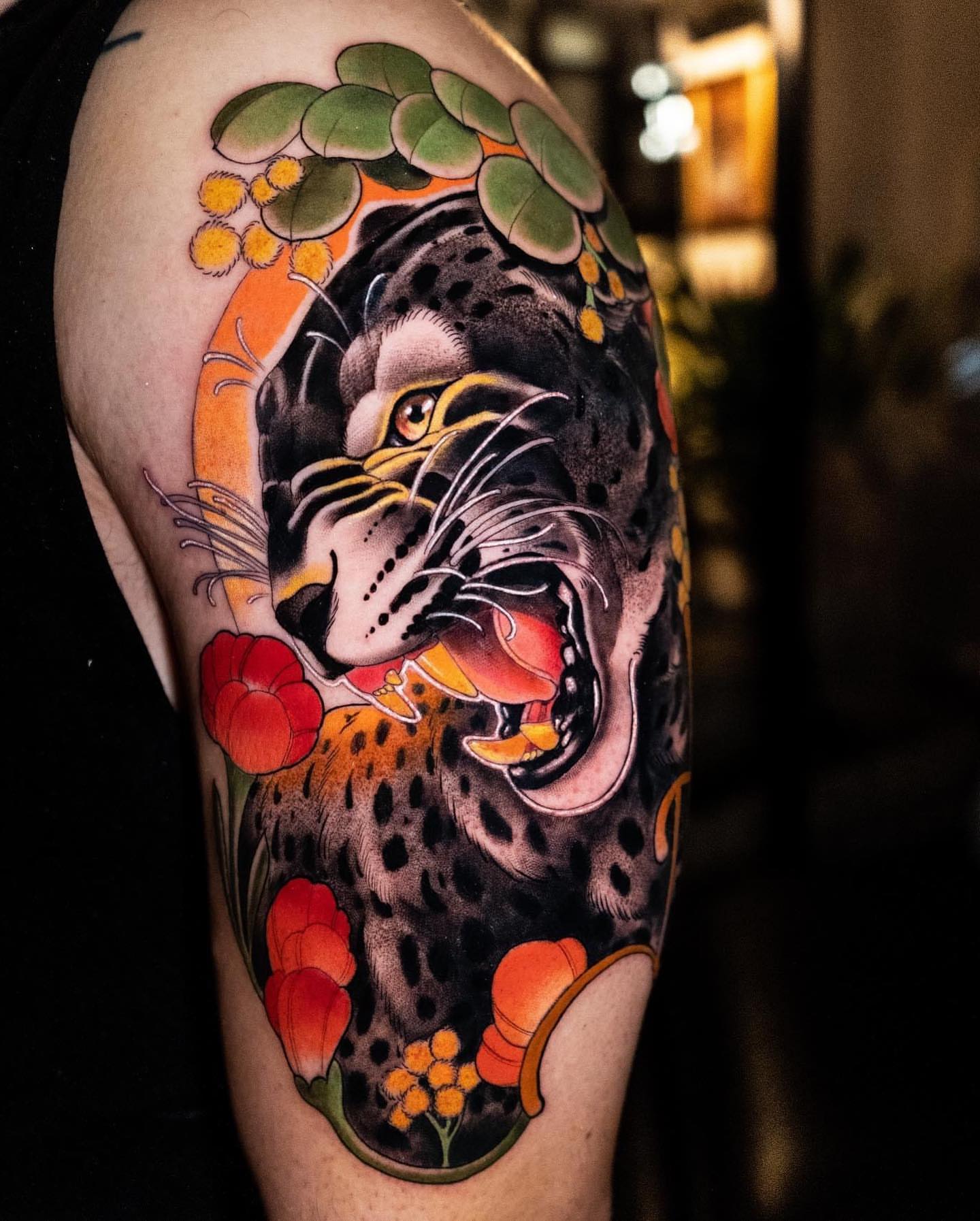 Leopard American traditional tattoo on the forearm by Andres Acevedo, Denver, Colorado