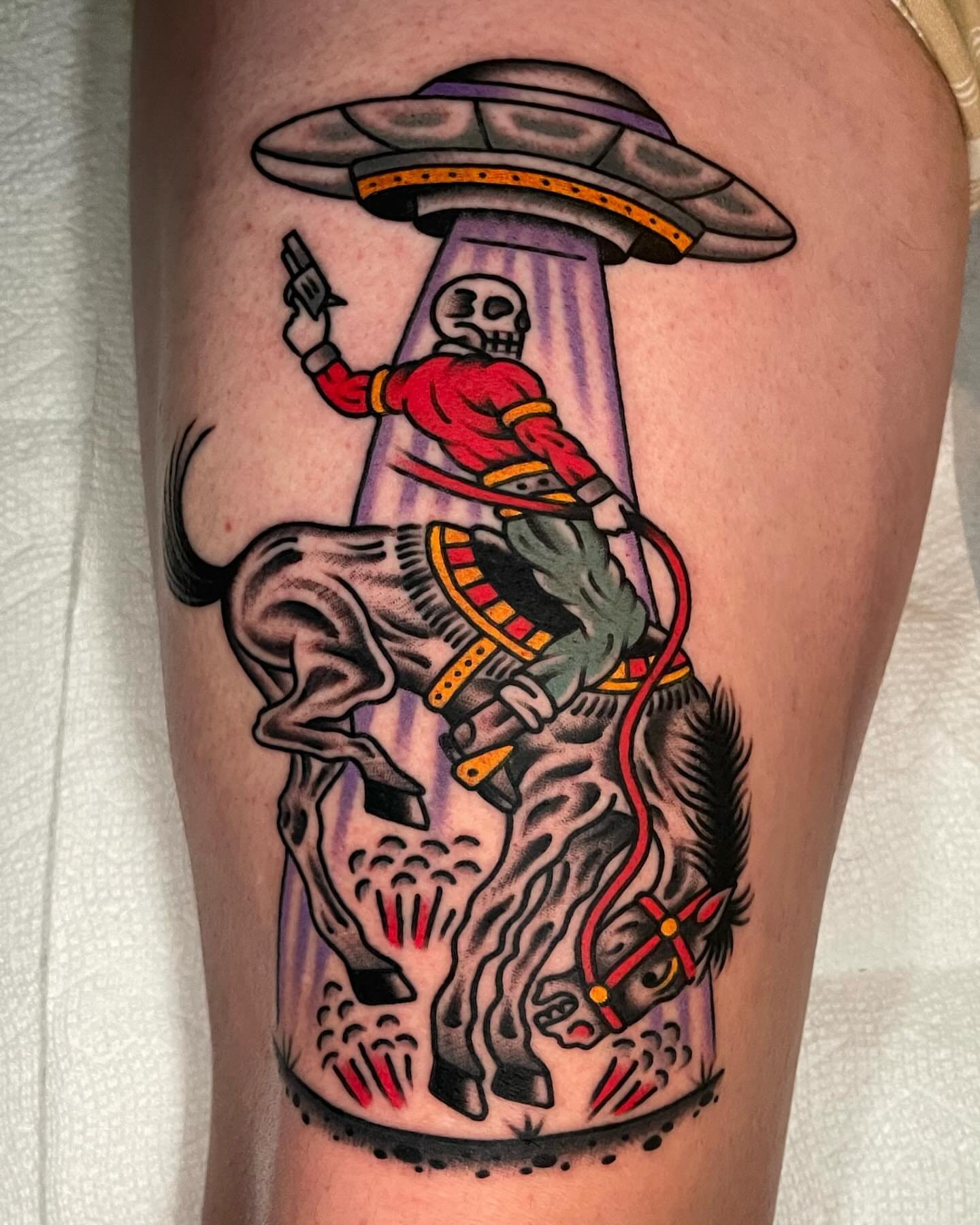 Cowboy skeleton riding horse American traditional tattoo on the thigh by James Shepherd, Austin, Texas