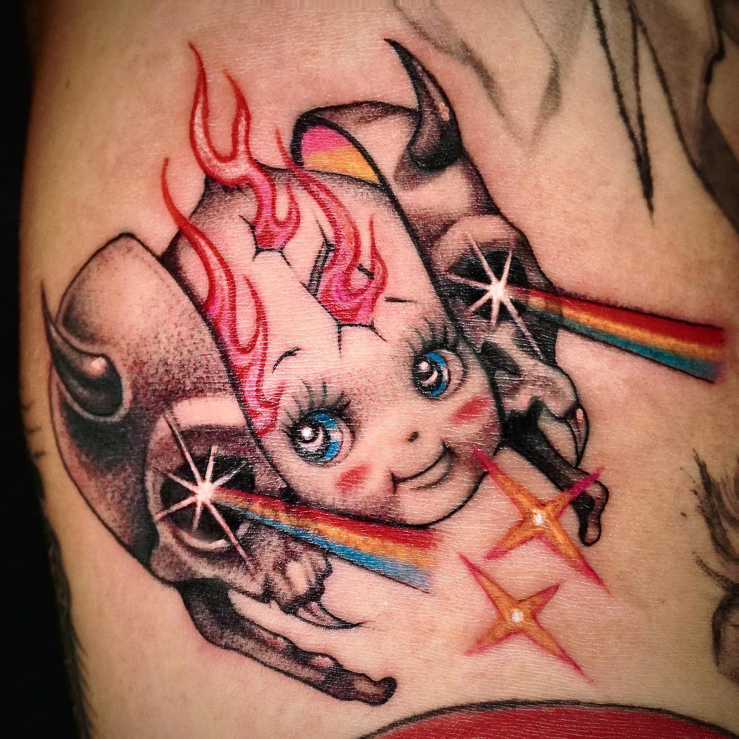 Chibi girl with horns anime tattoo on the upper arm by 吳盈慧, Los Angeles, California