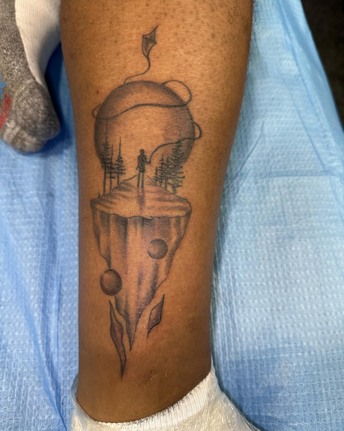 Floating landscape dotwork tattoo on the forearm by jersey ink tattoos, Elizabeth, New Jersey