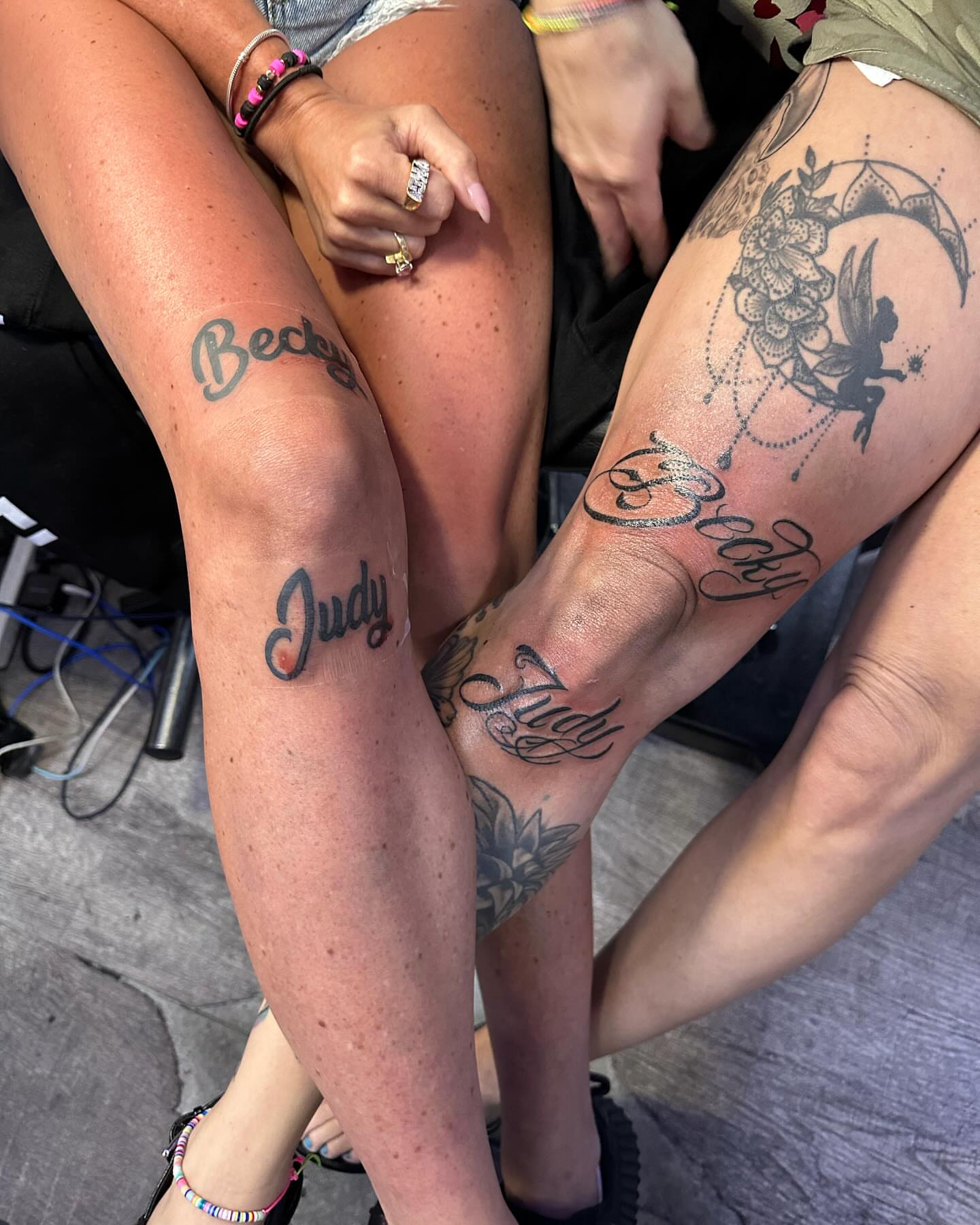 Names and fairy black and grey tattoo on the thigh by jersey ink tattoos, Elizabeth, New Jersey