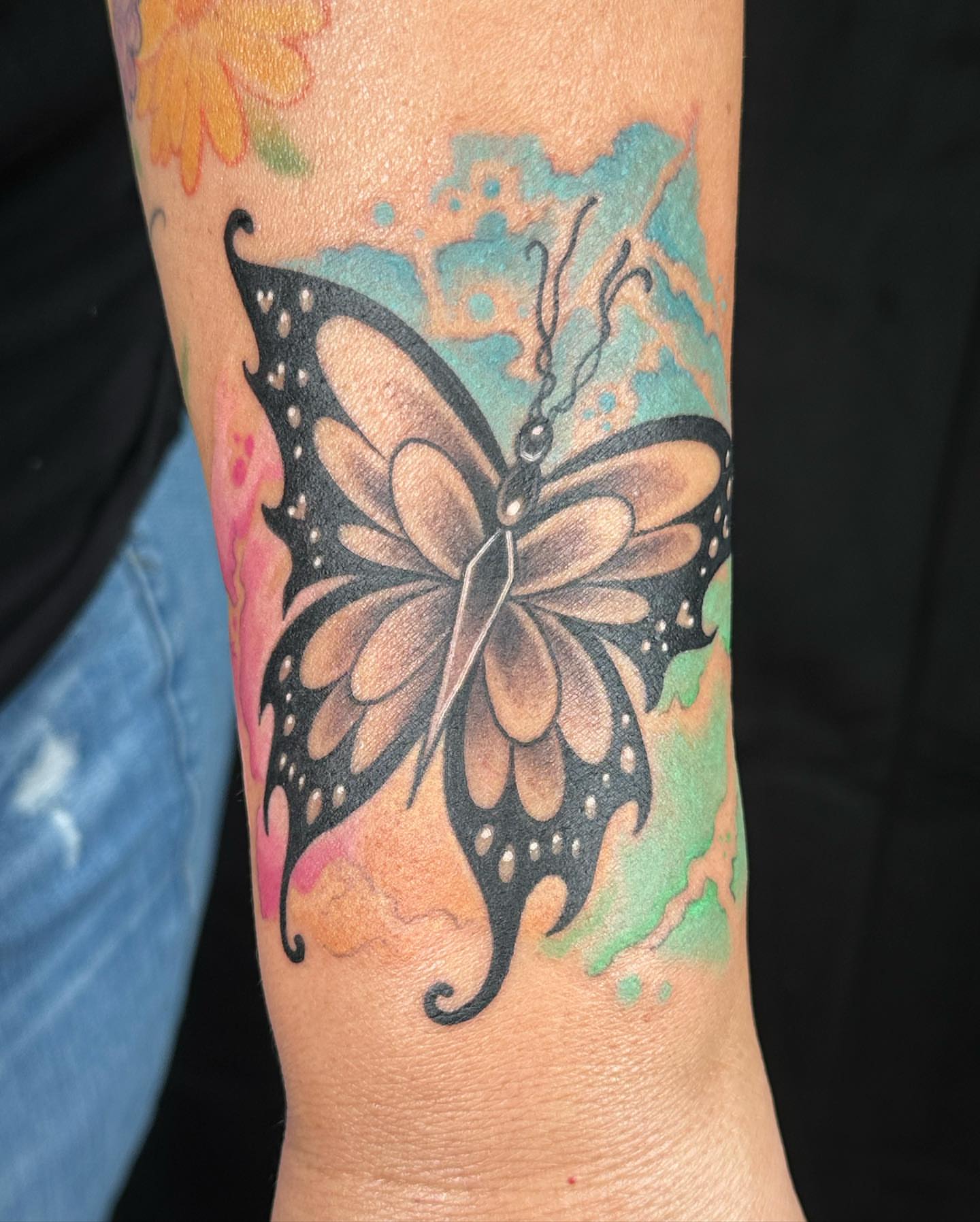 Butterfly dotwork tattoo on the forearm by B.G. Germershausen