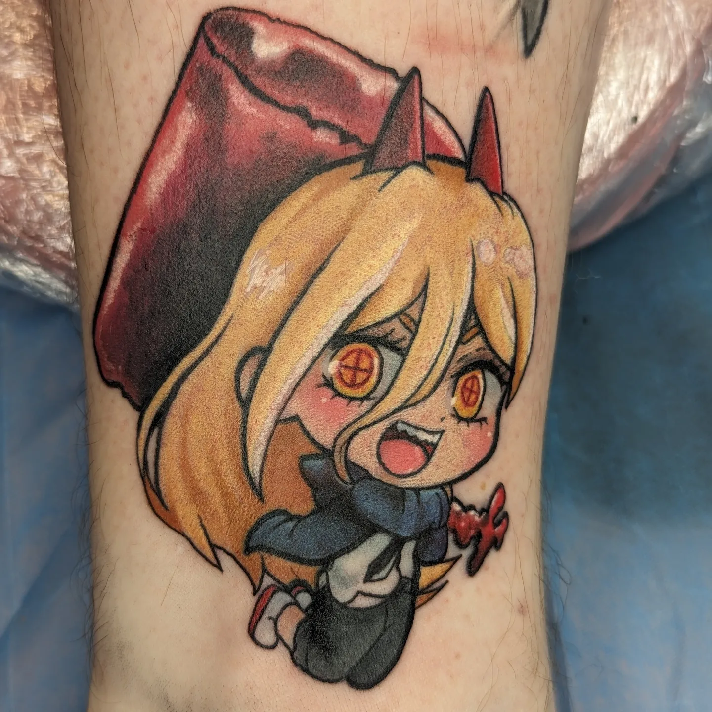 Anime character anime tattoo on the forearm by Harley Fulghum
