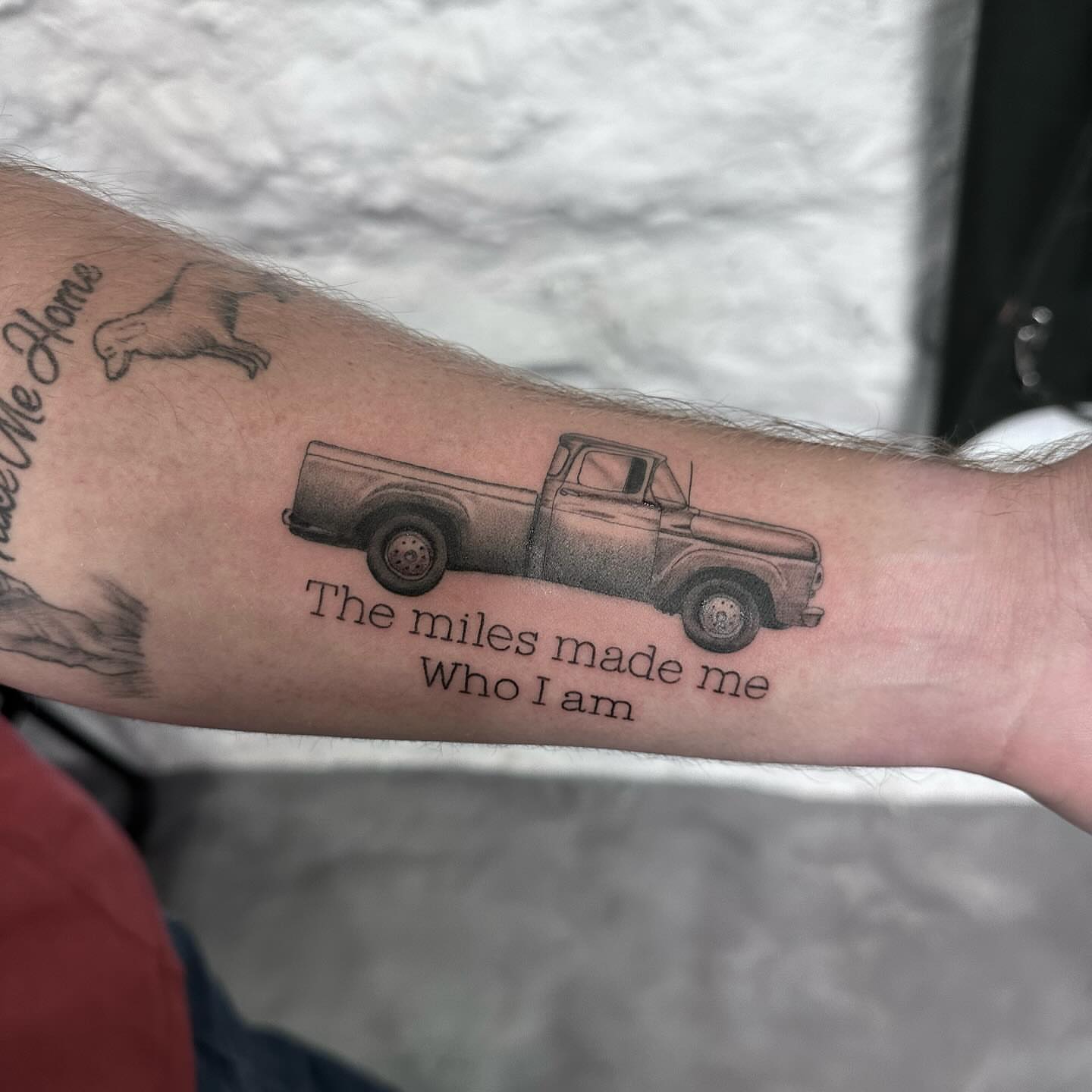 Truck black and grey tattoo on the forearm by Blake Owens, Nashville, Tennessee