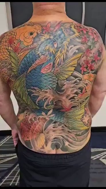 Dragon and koi fish japanese irezumi tattoo by James Vaughn