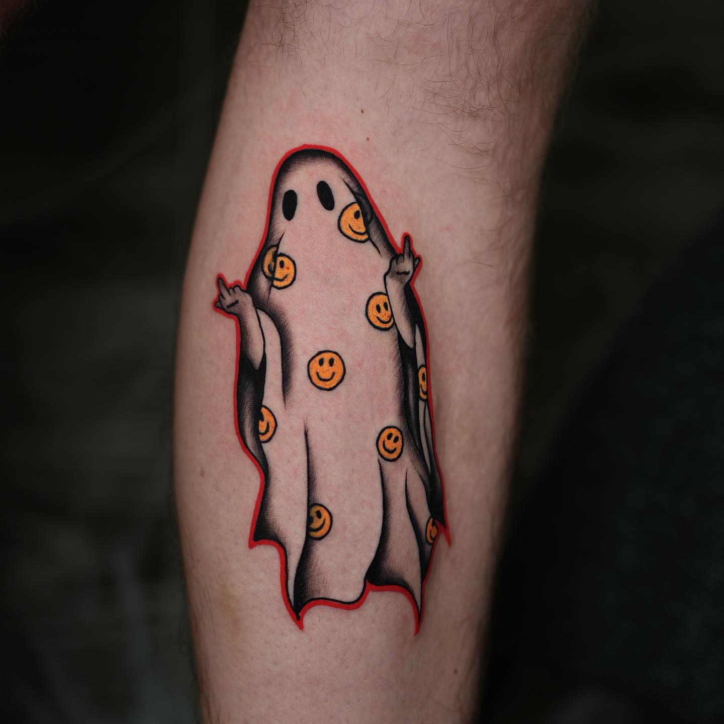 Ghost with smiley faces trash polka tattoo on the forearm by @katuvetattoo