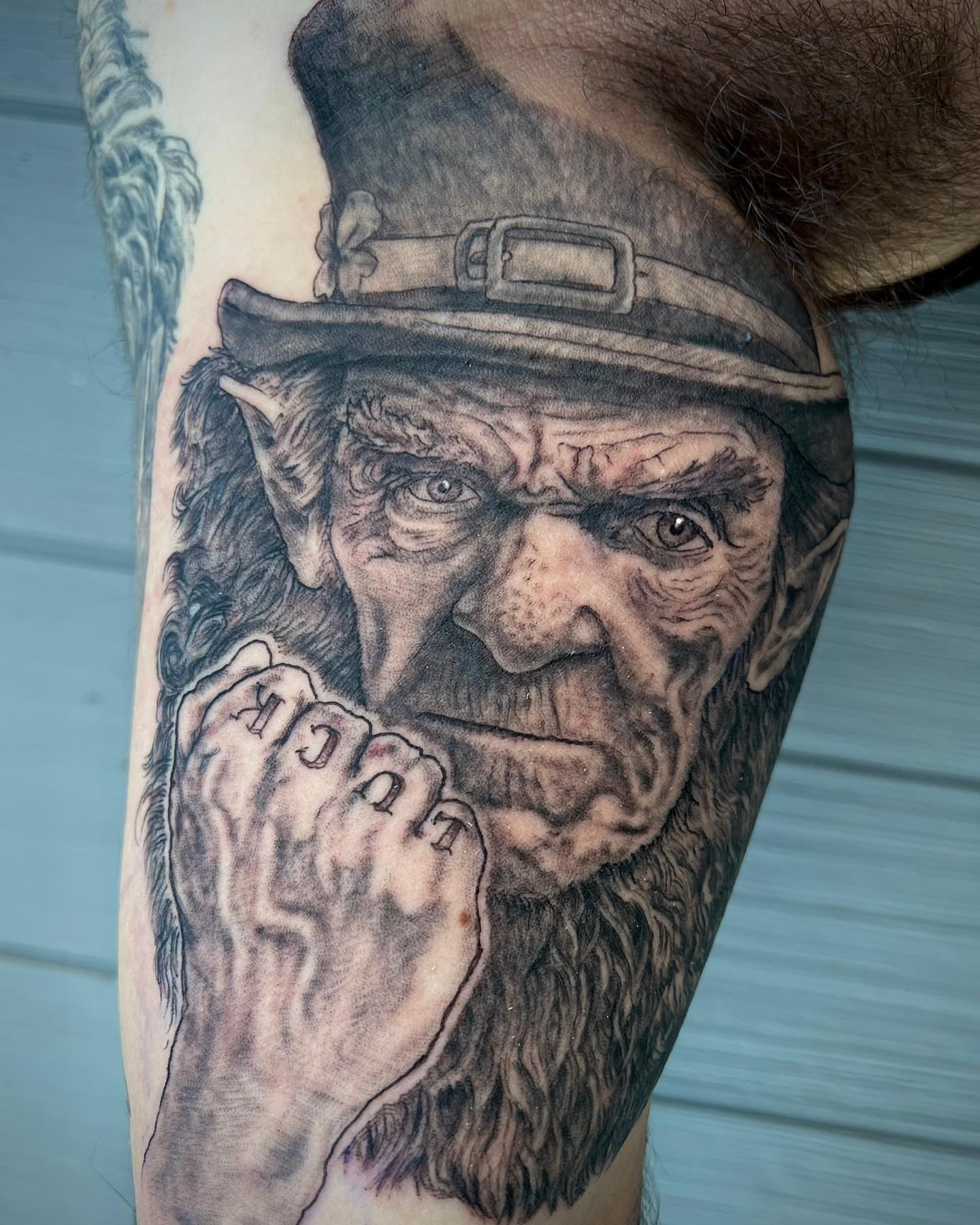 Elf with hat realism tattoo on the forearm by Iconic Ink, Millbury, Massachusetts