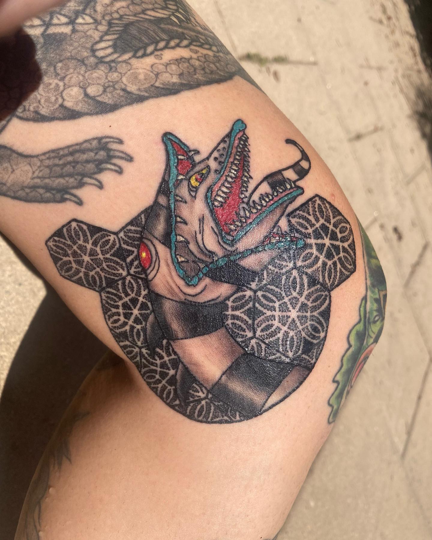Serpent American traditional tattoo on the thigh by Nicholas Jones