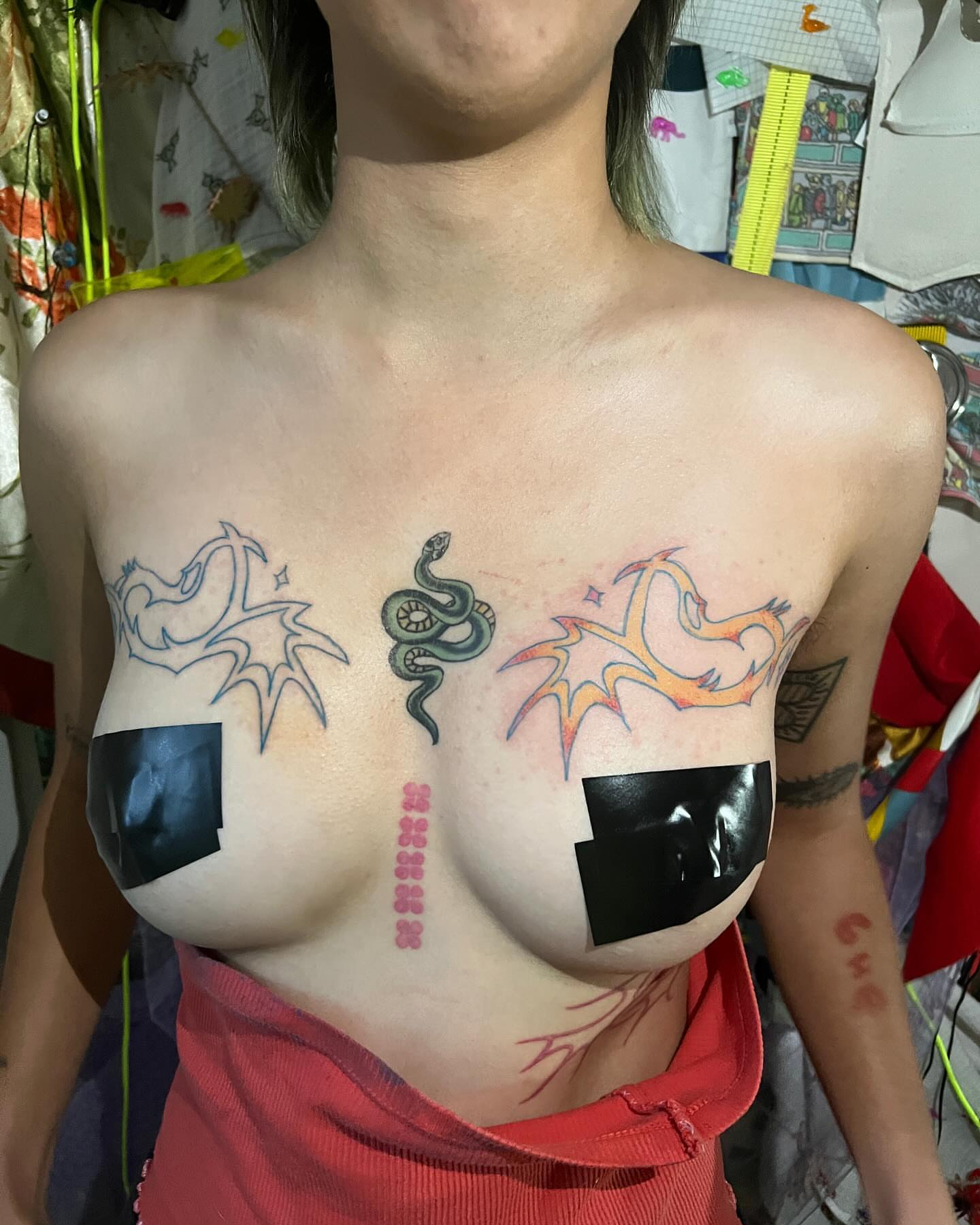 Dragon and snake dotwork tattoo on the chest by mars