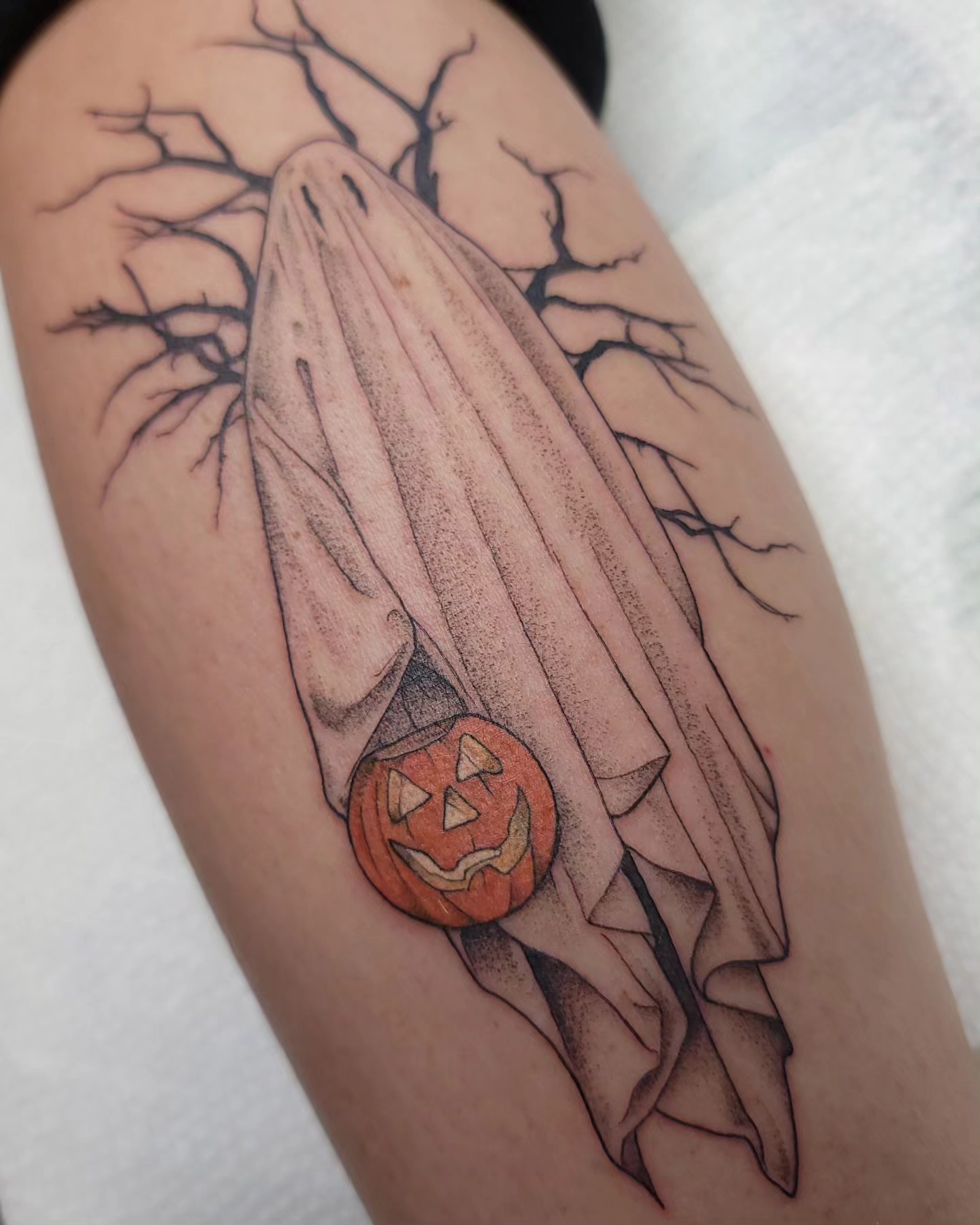 Ghost with pumpkin dotwork tattoo on the thigh by Ghost