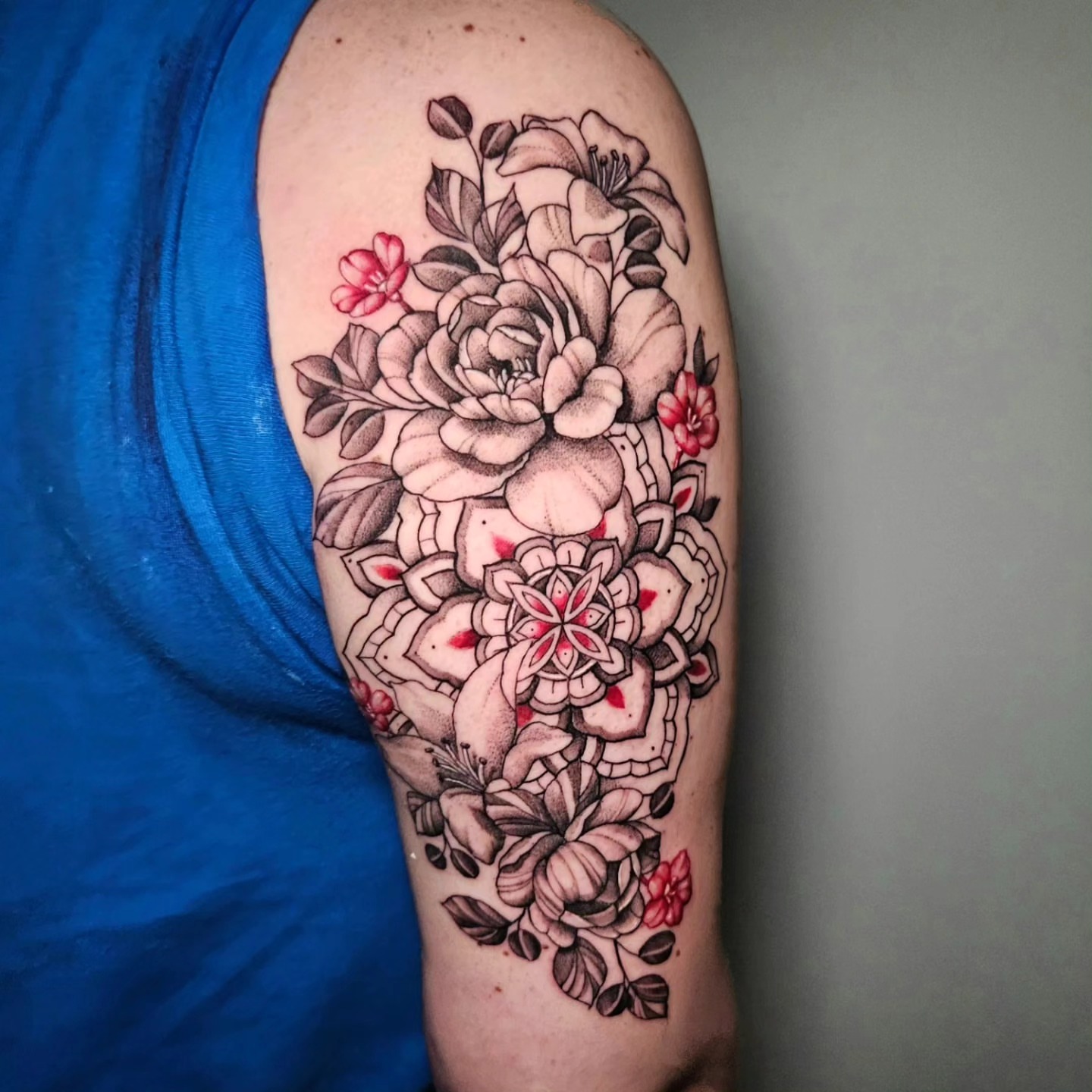 Floral bouquet black and grey tattoo on the forearm by Sydney Paige, Mentor, Ohio