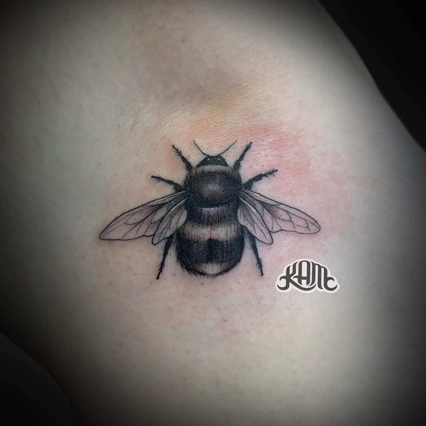 Bee realism tattoo on the shoulder by Keith (KAM) Miller