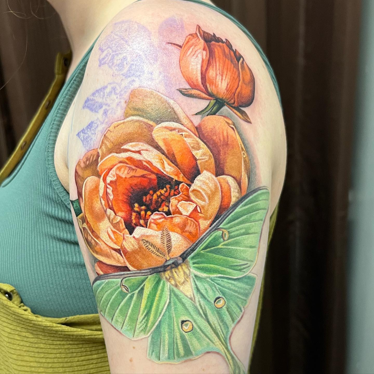 Peony and butterfly realism tattoo on the upper arm by Irina Shapiro, Somerville, Massachusetts
