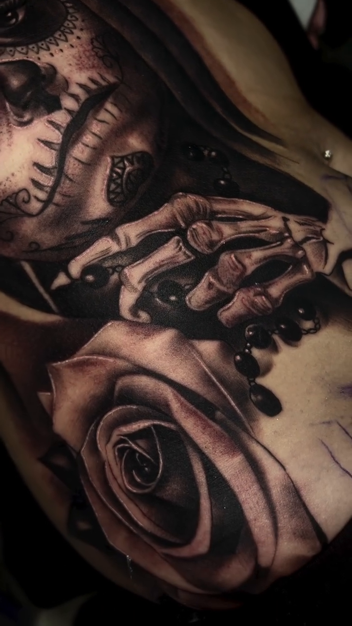 Woman and rose Chicano tattoo by Tattoo