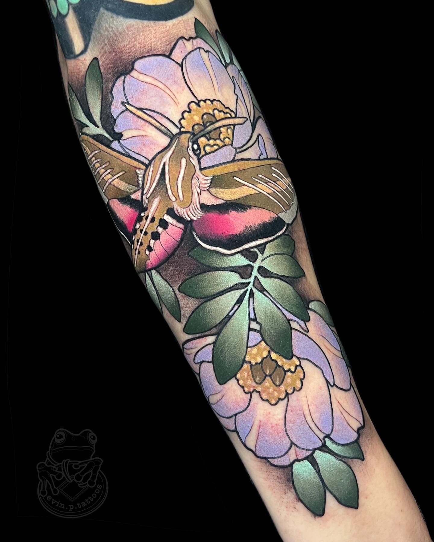 Flower moth American traditional tattoo on the forearm by Evin Pfaff, Bedford, Pennsylvania