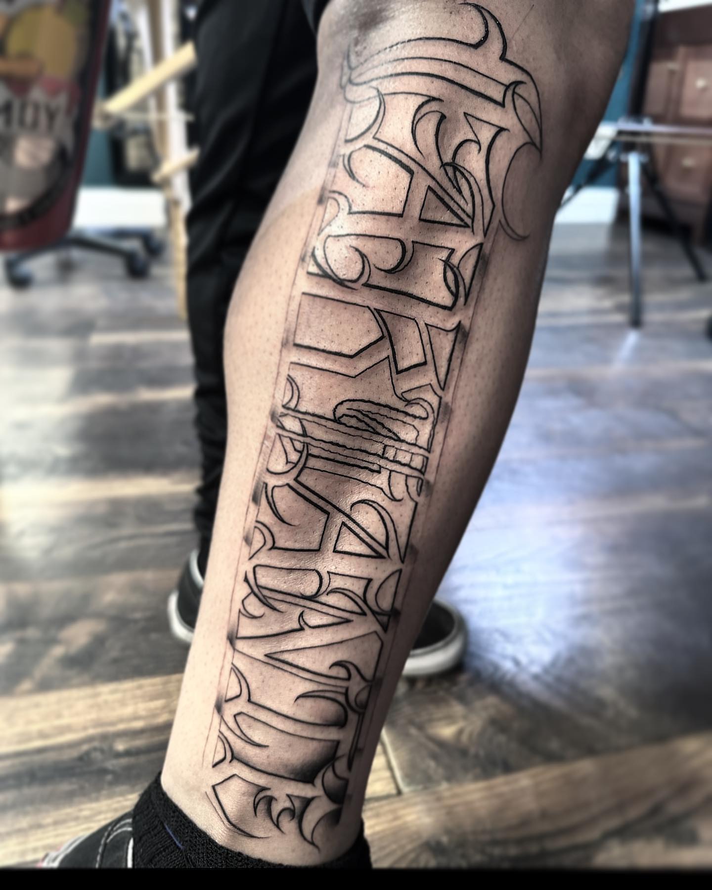 Script lettering lettering script tattoo on the calf by Las Vegas Tattoo Artist