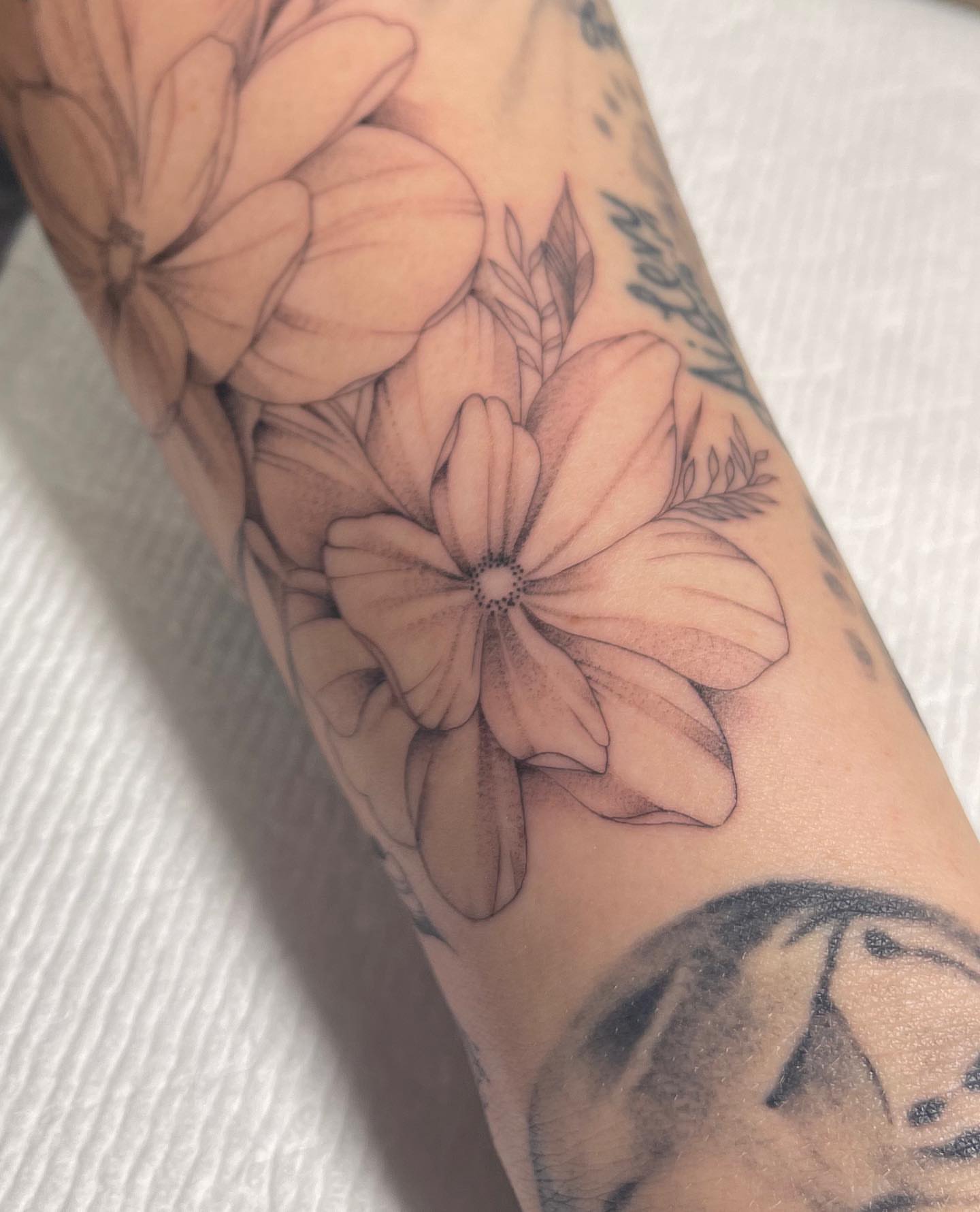 Flower dotwork tattoo on the forearm by Beans
