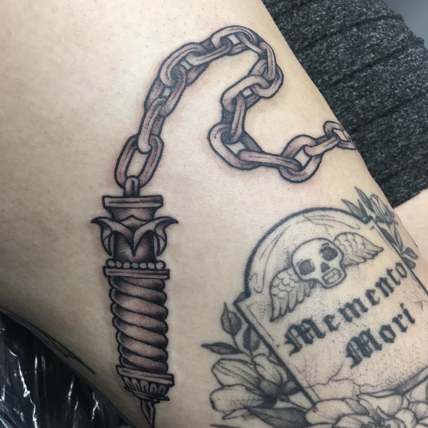 Chain and skull black and grey tattoo on the forearm by Abbey Martin, Nashville, Tennessee