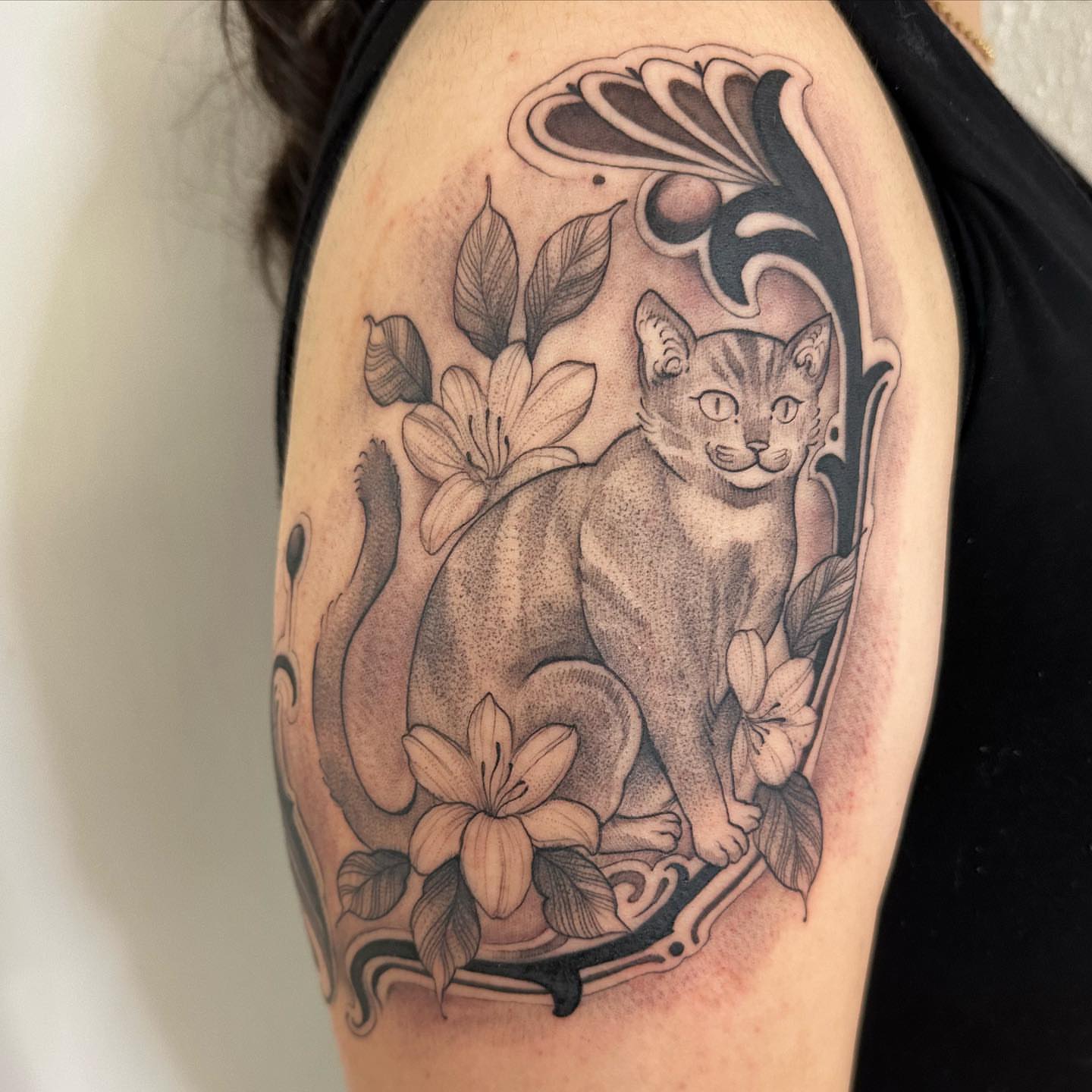 Cat and flowers realism tattoo on the shoulder by Juan Vega (tony)