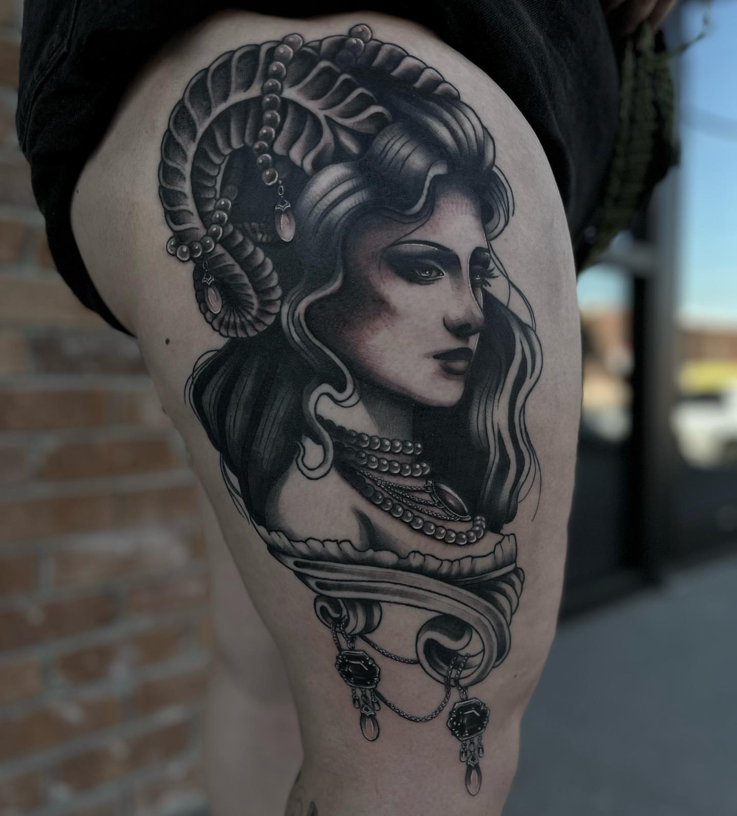 Woman with horns realism tattoo on the thigh by Myla Jane, Houston, Texas