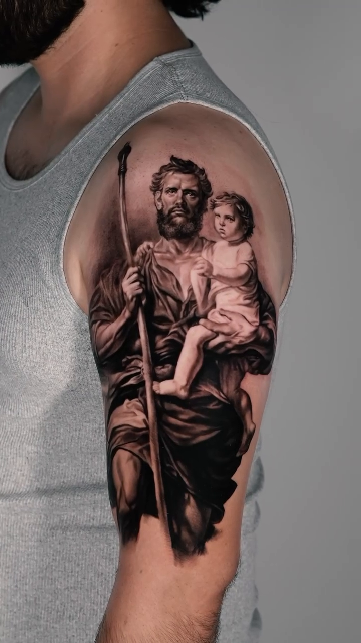 Saint Joseph with child realism tattoo by Giona Starace