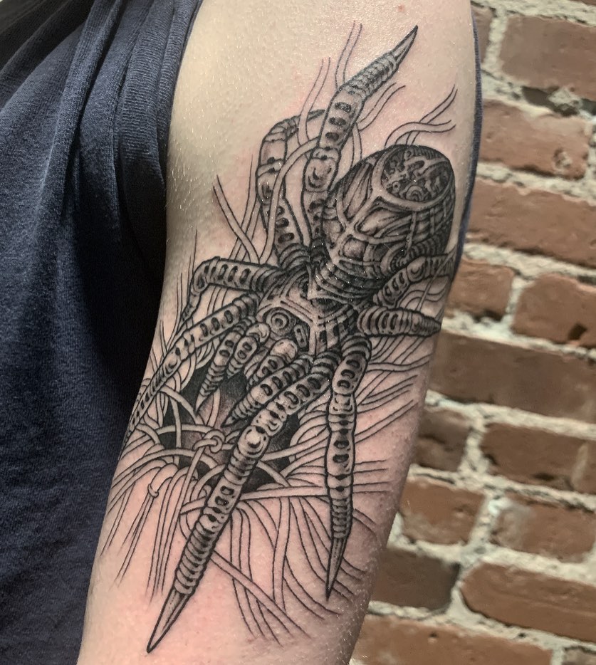 Mechanical spider blackwork tattoo on the forearm by dayton skuse, Portland, Oregon