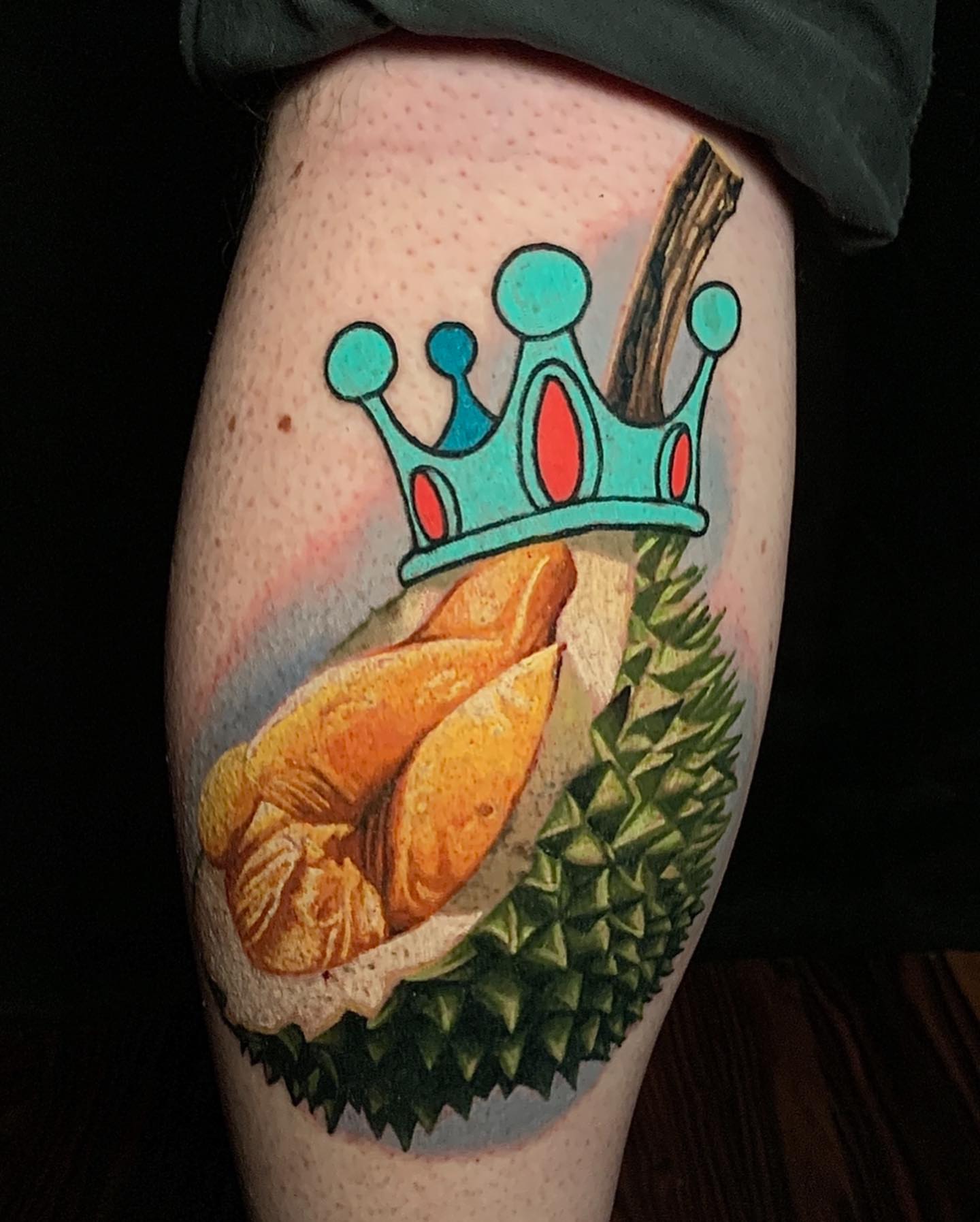 Durian and chicken realism tattoo on the thigh by Joshua L Wilson, Dayton, Ohio
