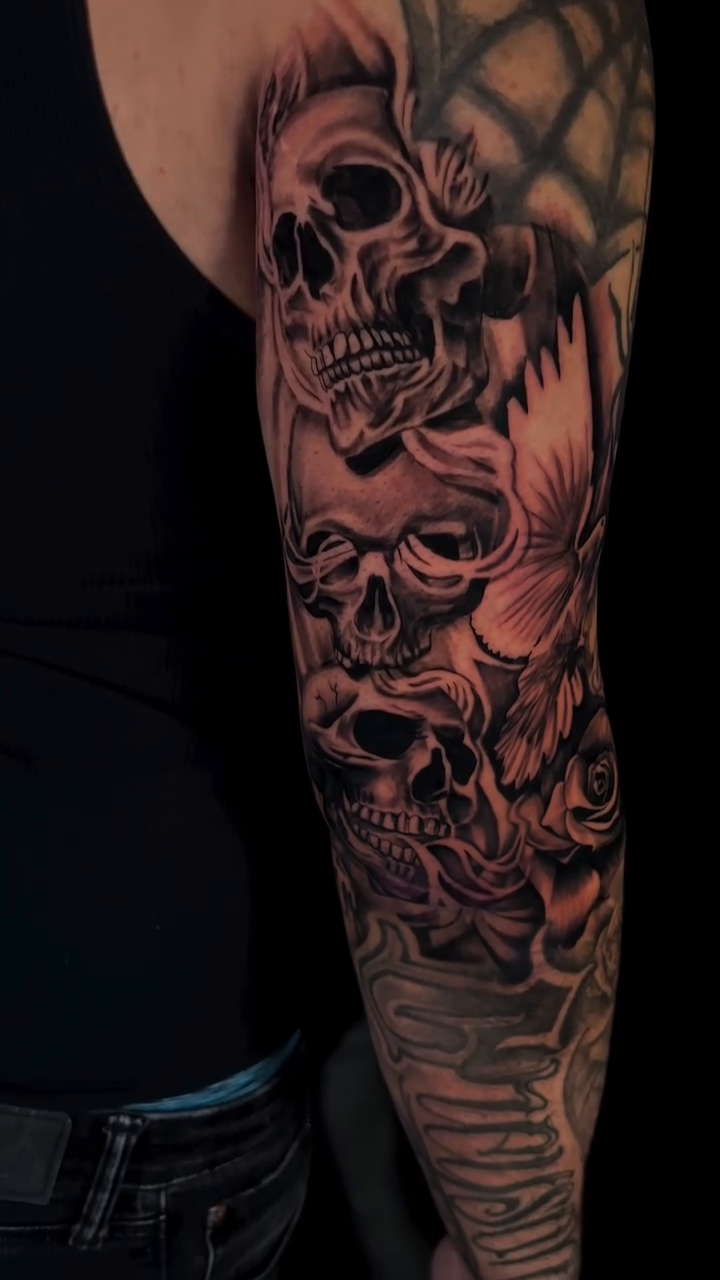 Skulls, roses, spiderweb dark realism tattoo by Brayan Molina